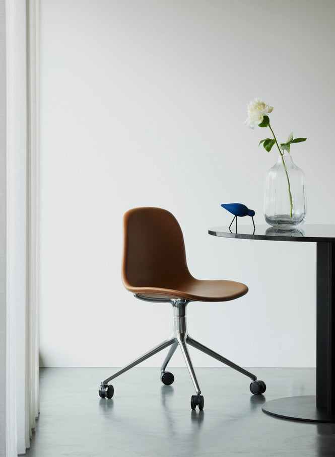 4W brown office chair with a black base on wheels