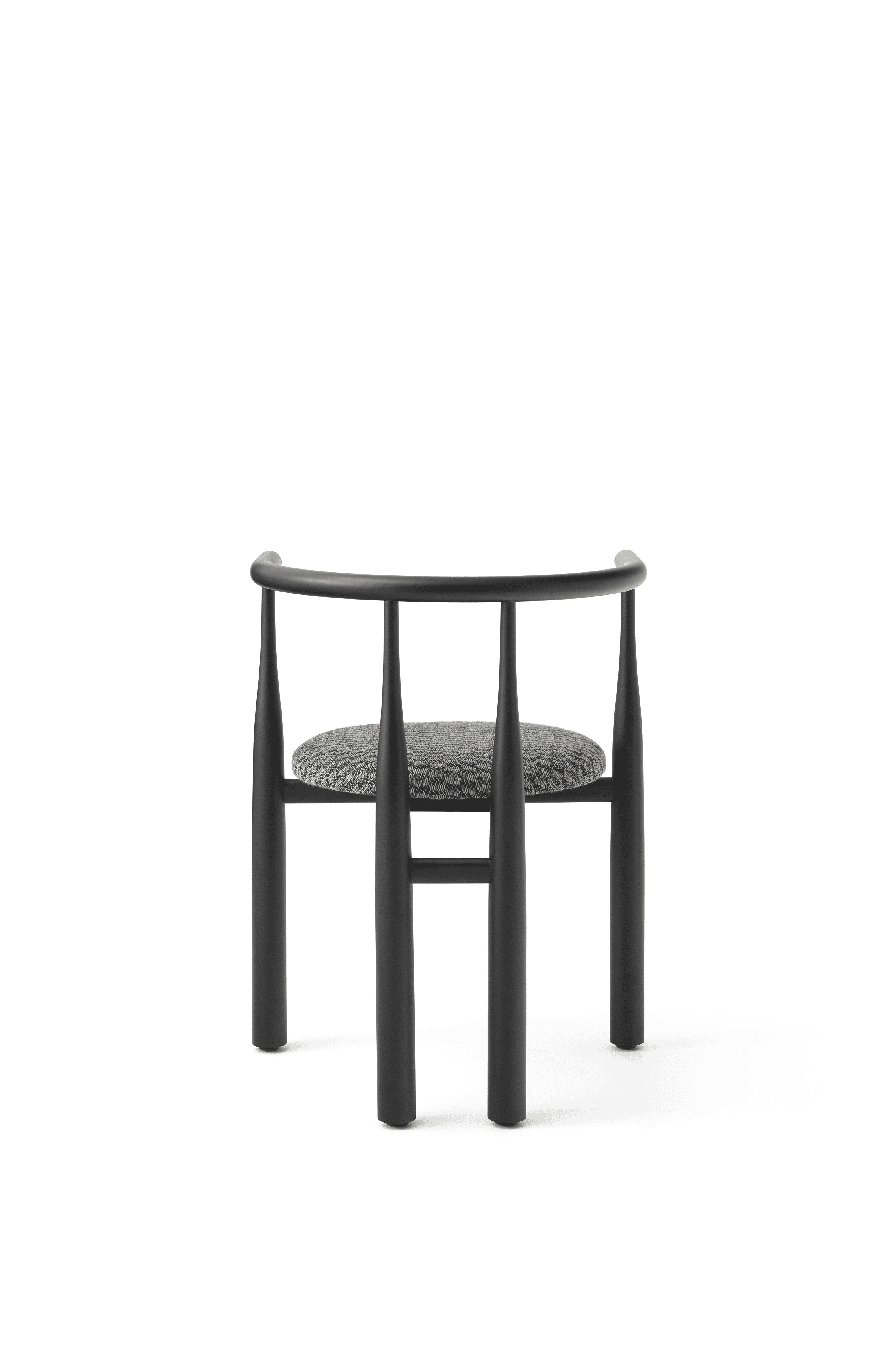 Bukowski chair upholstered with a black beech base