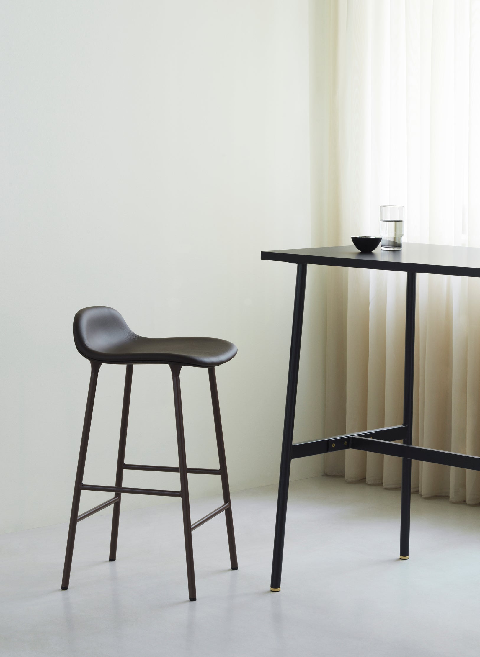 Upholstered HAKER forms with a black base