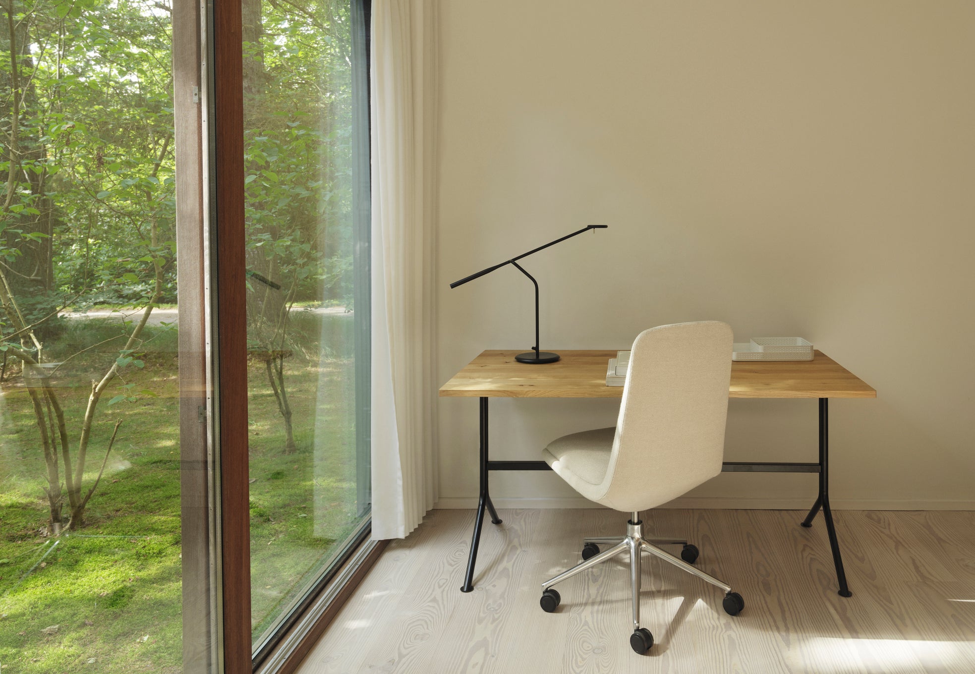Kip desk, a natural pine with a black base