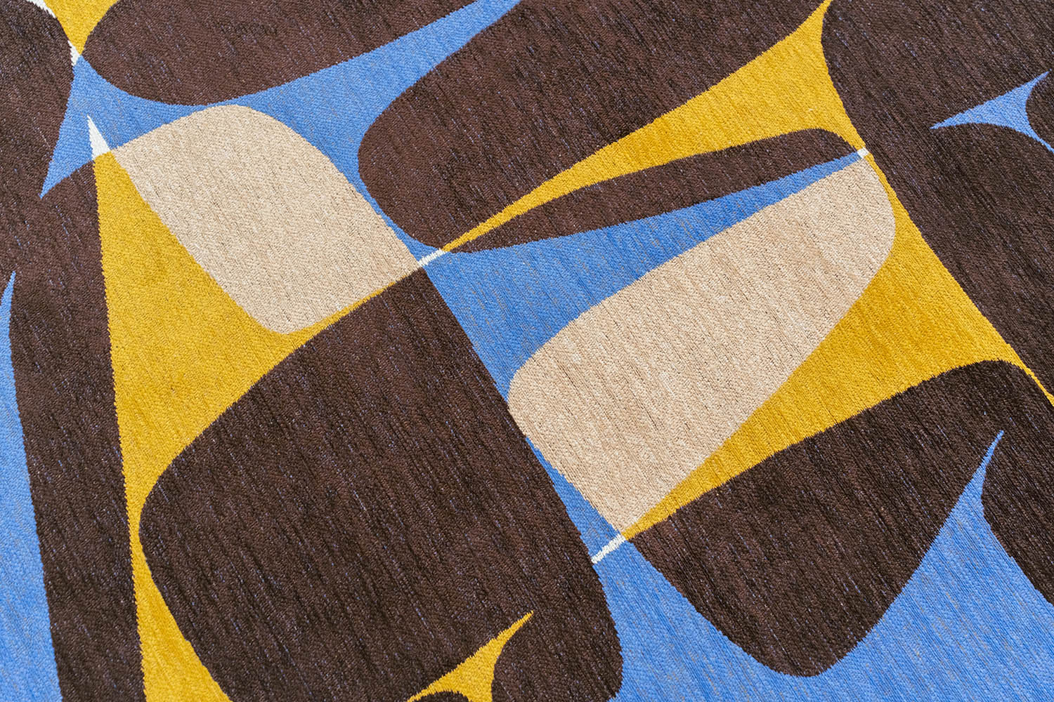 STONES rug in white with brown and blue