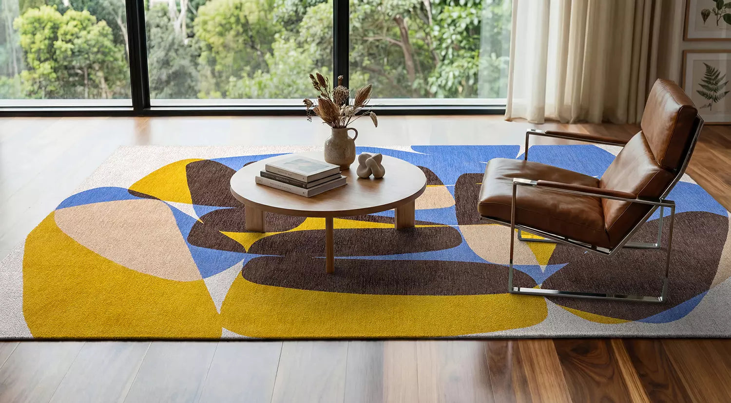 STONES rug in white with brown and blue