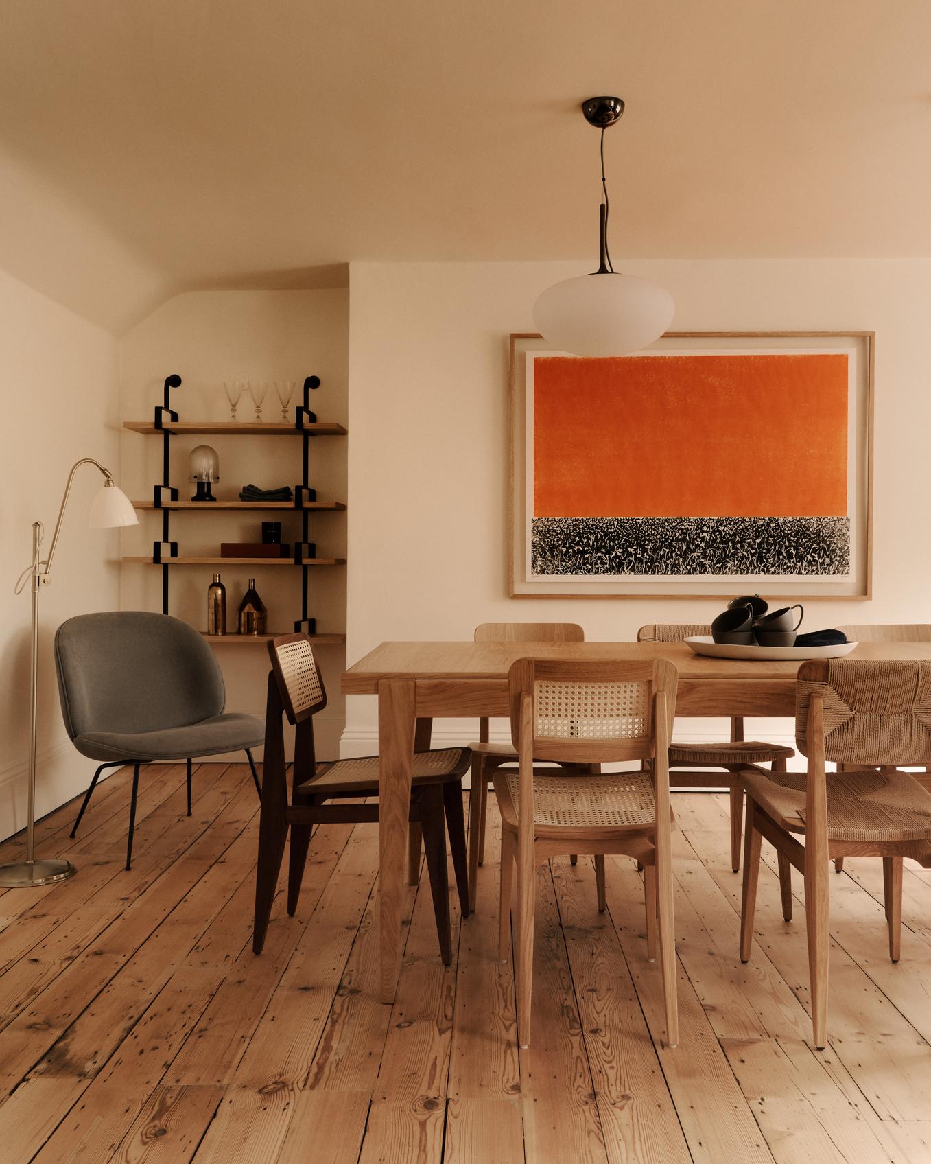 BEETLE upholstered armchair with brass base