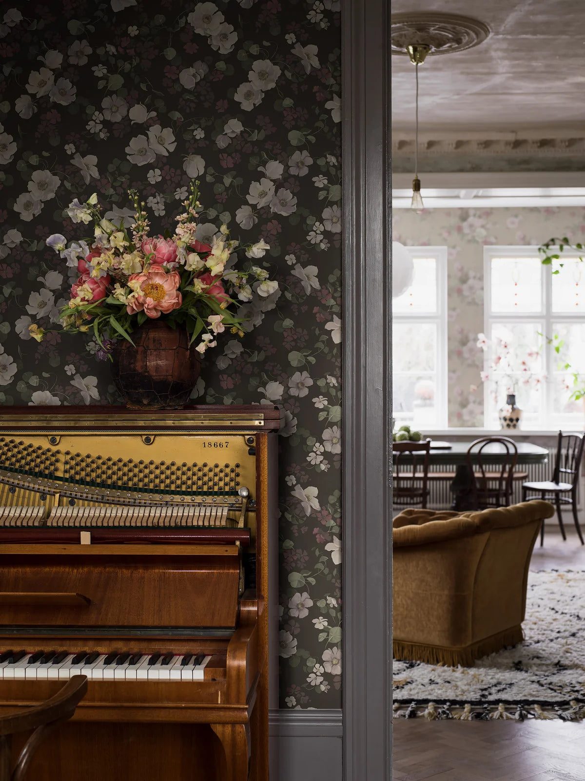 Non-woven paper wallpaper with an enchanting flower pattern in muted brown and white