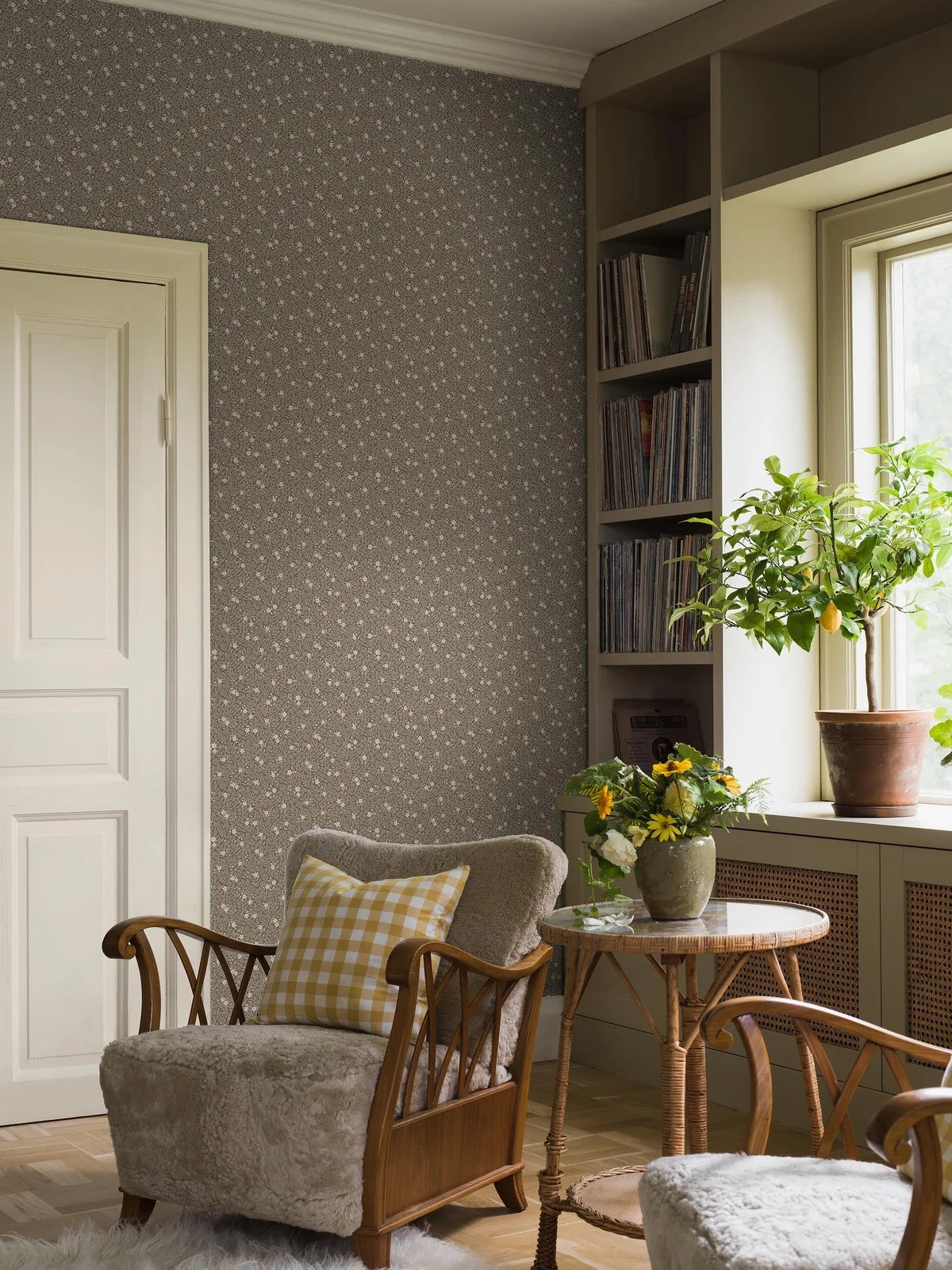 Brown MYRTEN wallpaper with a floral pattern of flowers and leaves in white