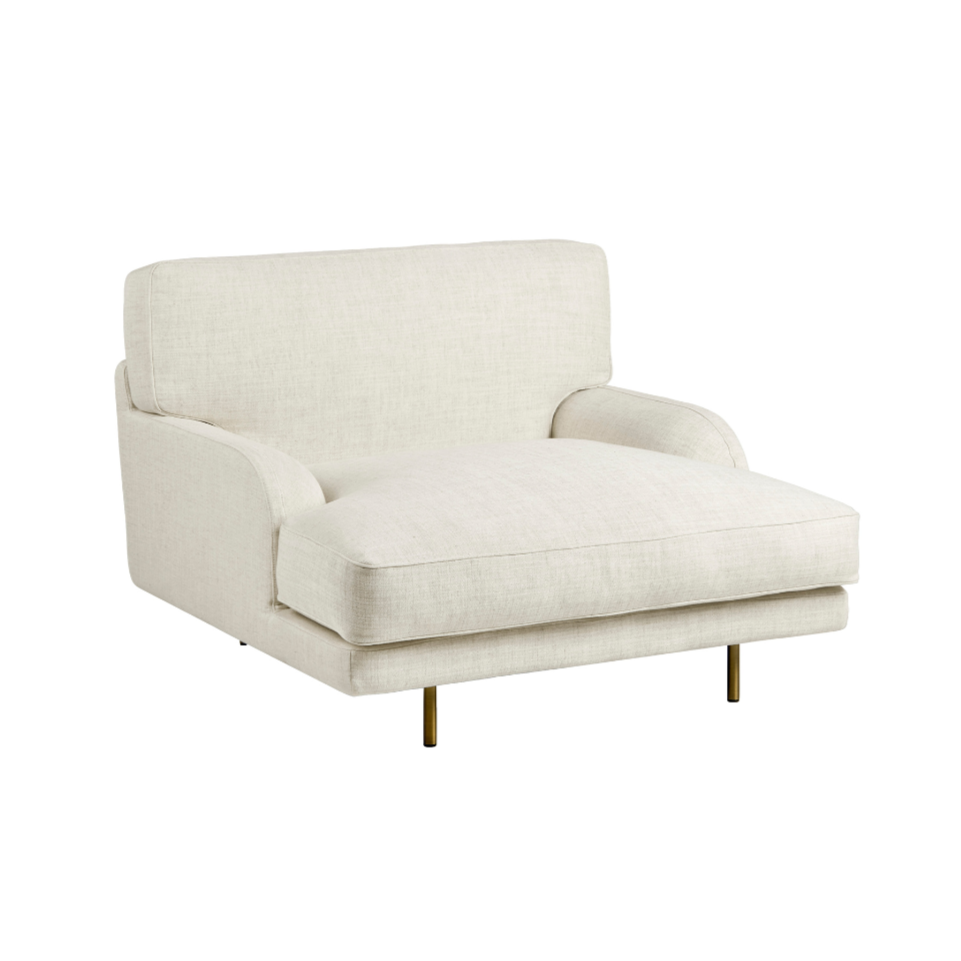 Fotel FLANEUR čalúnený s mosadzným podstavcom