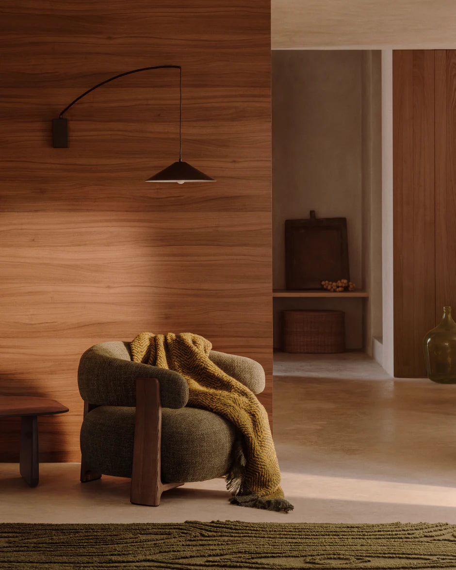 GRANITE green armchair with a dark ash base