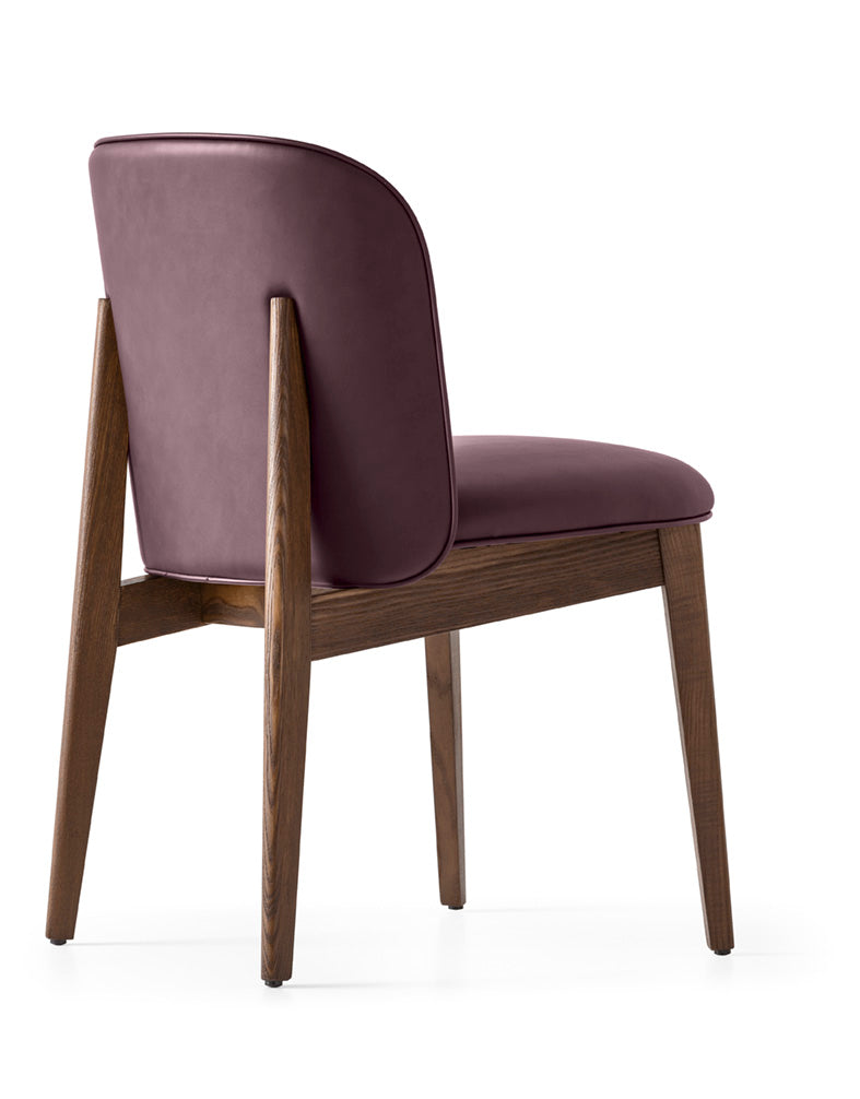 ABREY upholstered chair with a dark wooden base