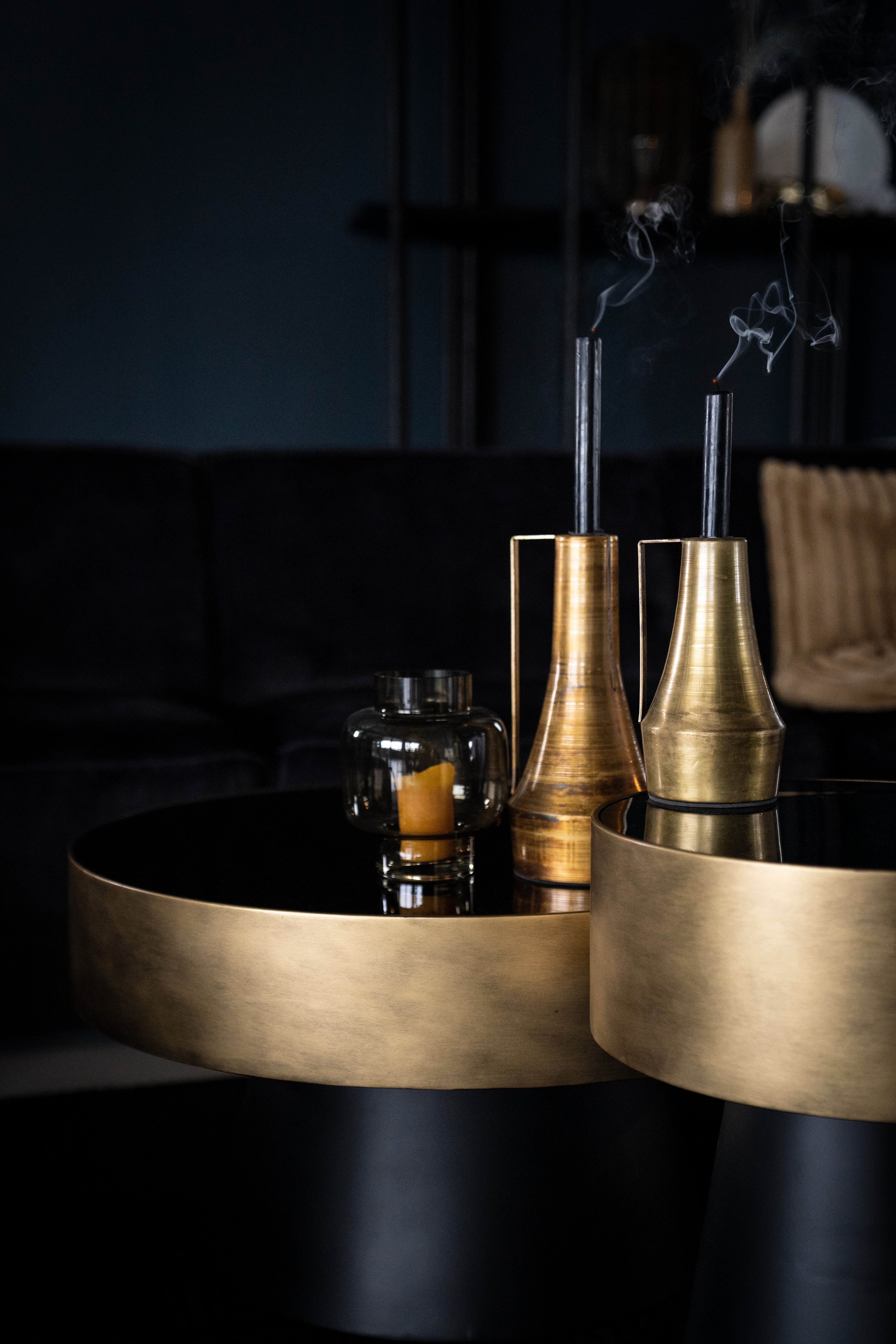 BUNGA coffee table in gold with a black base