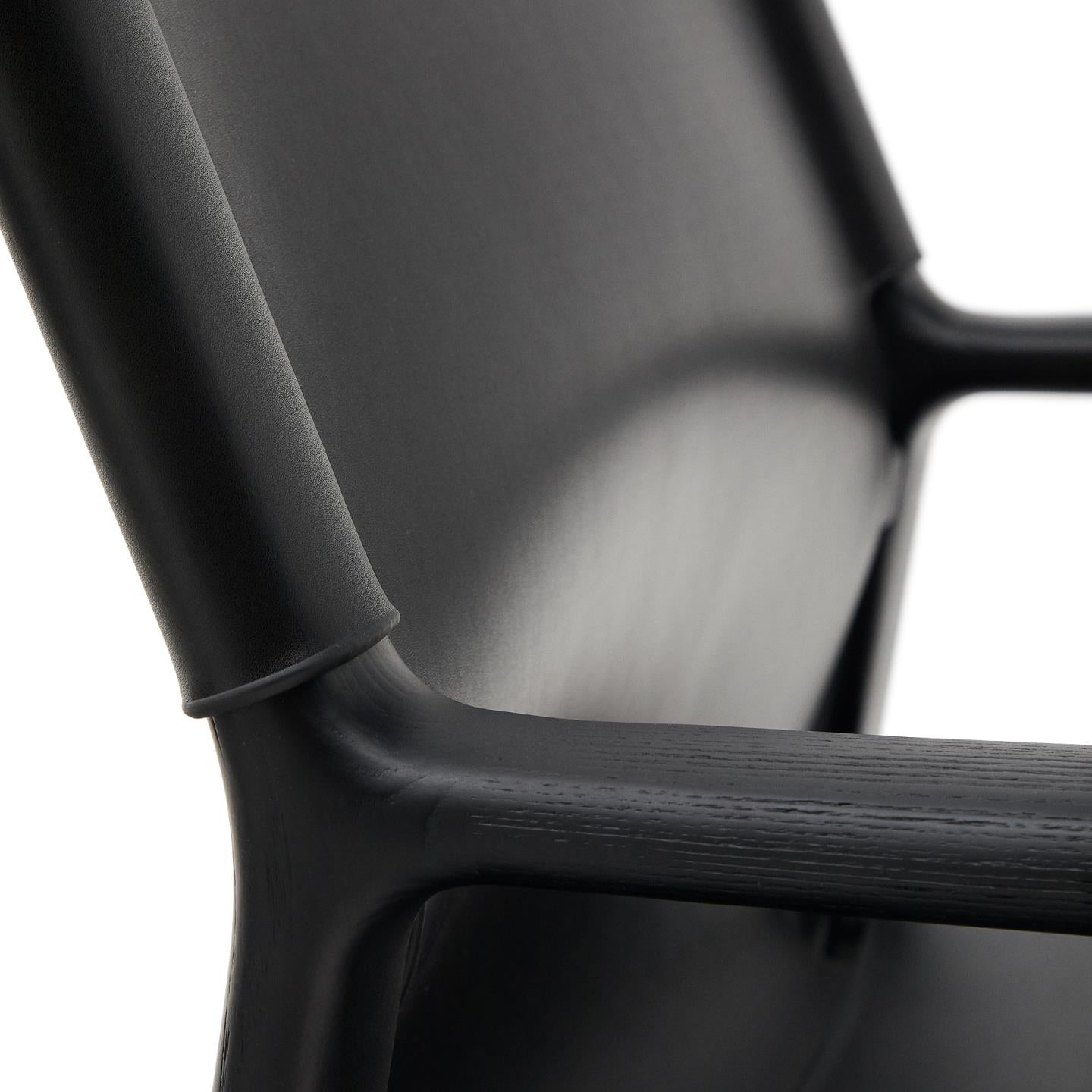 JAN armchair in black recycled leather with black ash wood