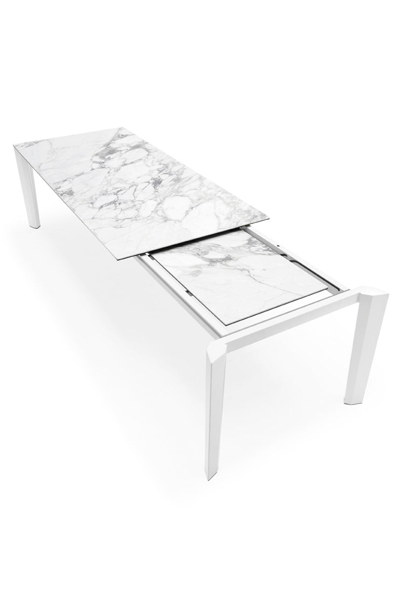 DELTA extendable table with a white top and black base