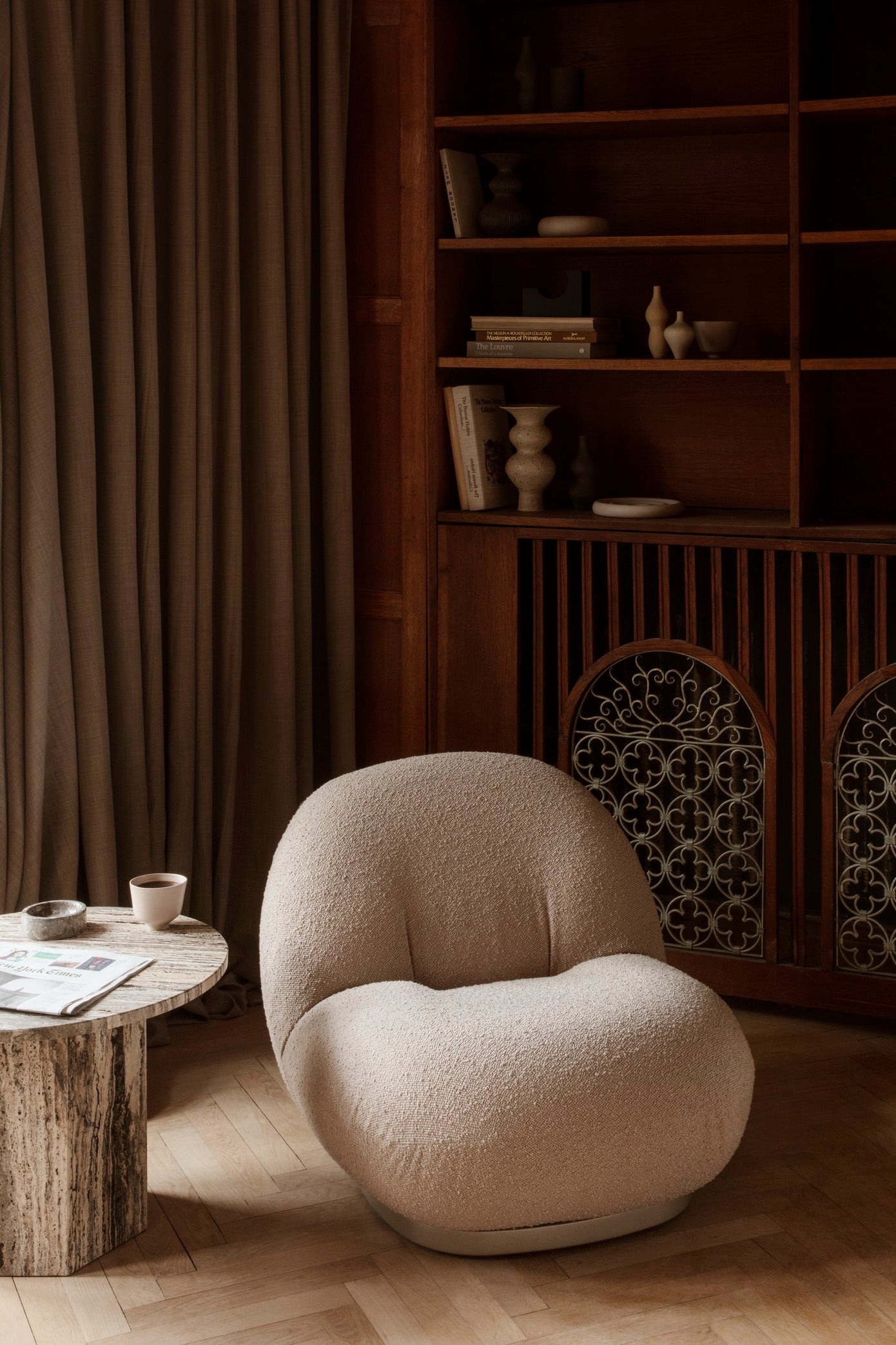 PACHA upholstered armchair with a gold base