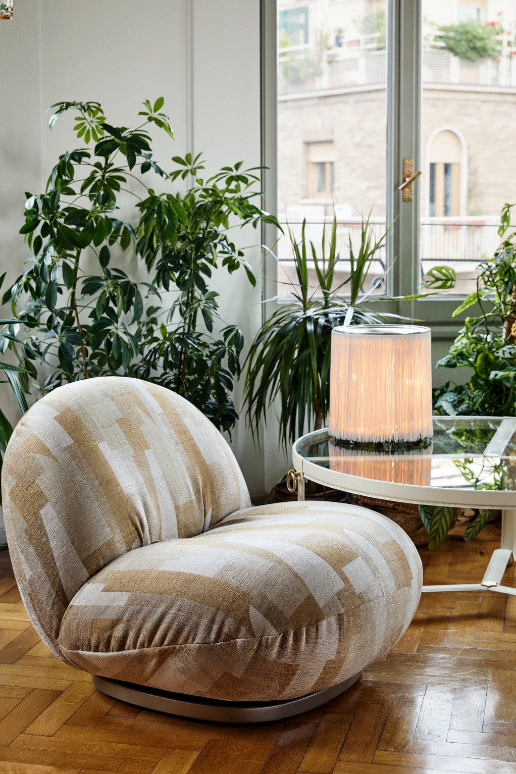 PACHA upholstered armchair with a gold base