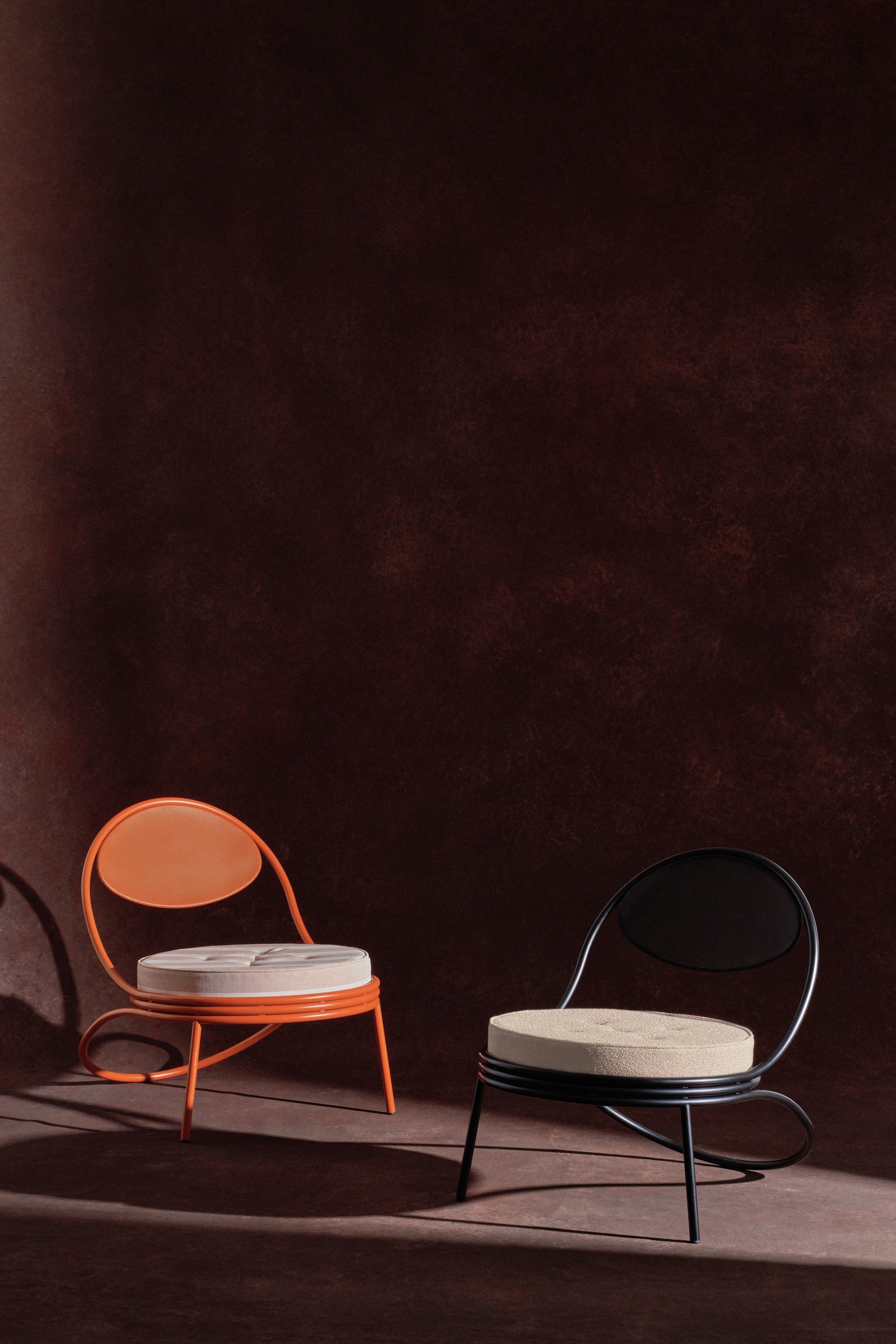 COPACABANA armchair upholstered with an orange base