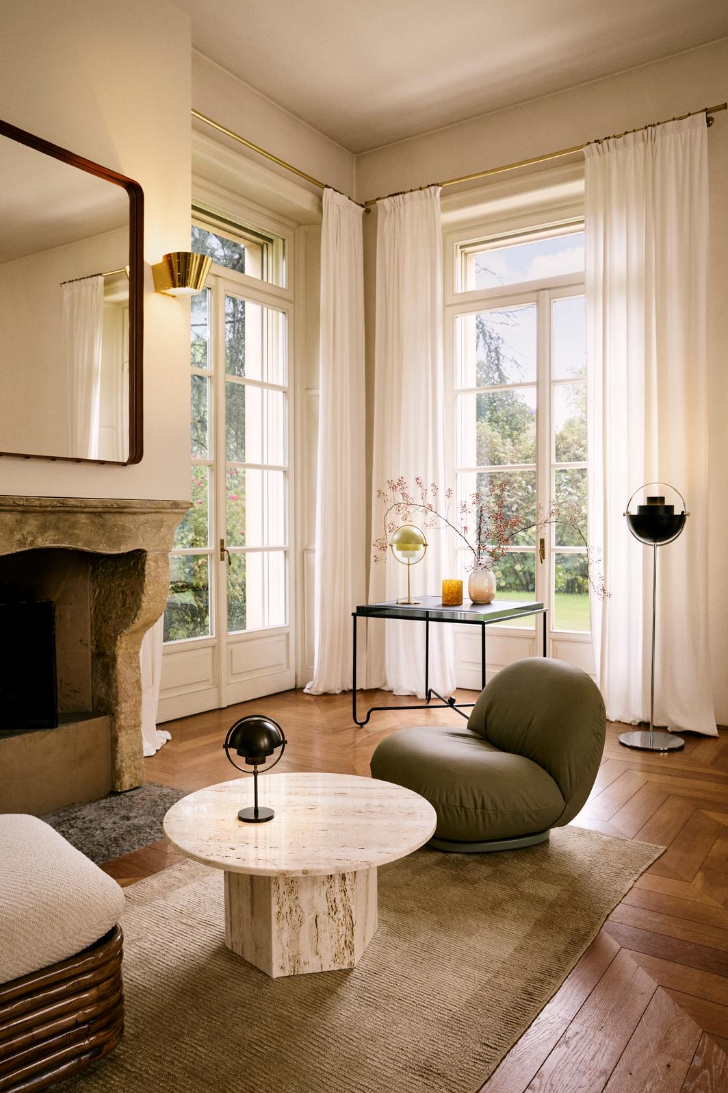 PACHA upholstered armchair with a gold base