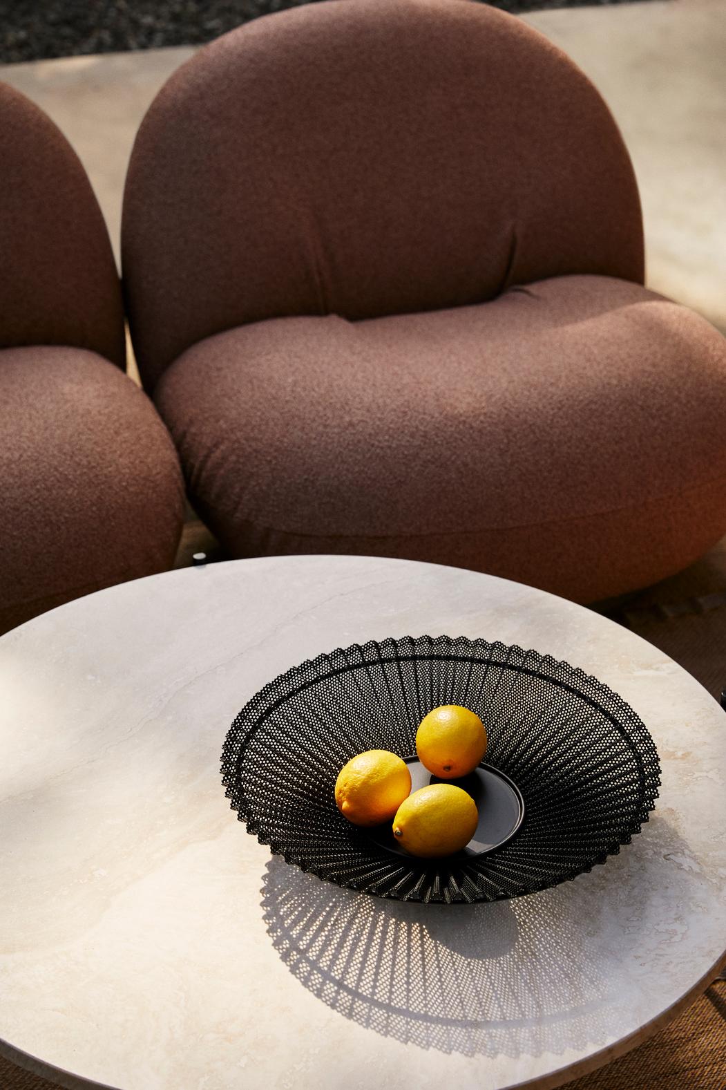 PACHA upholstered armchair with a gold base