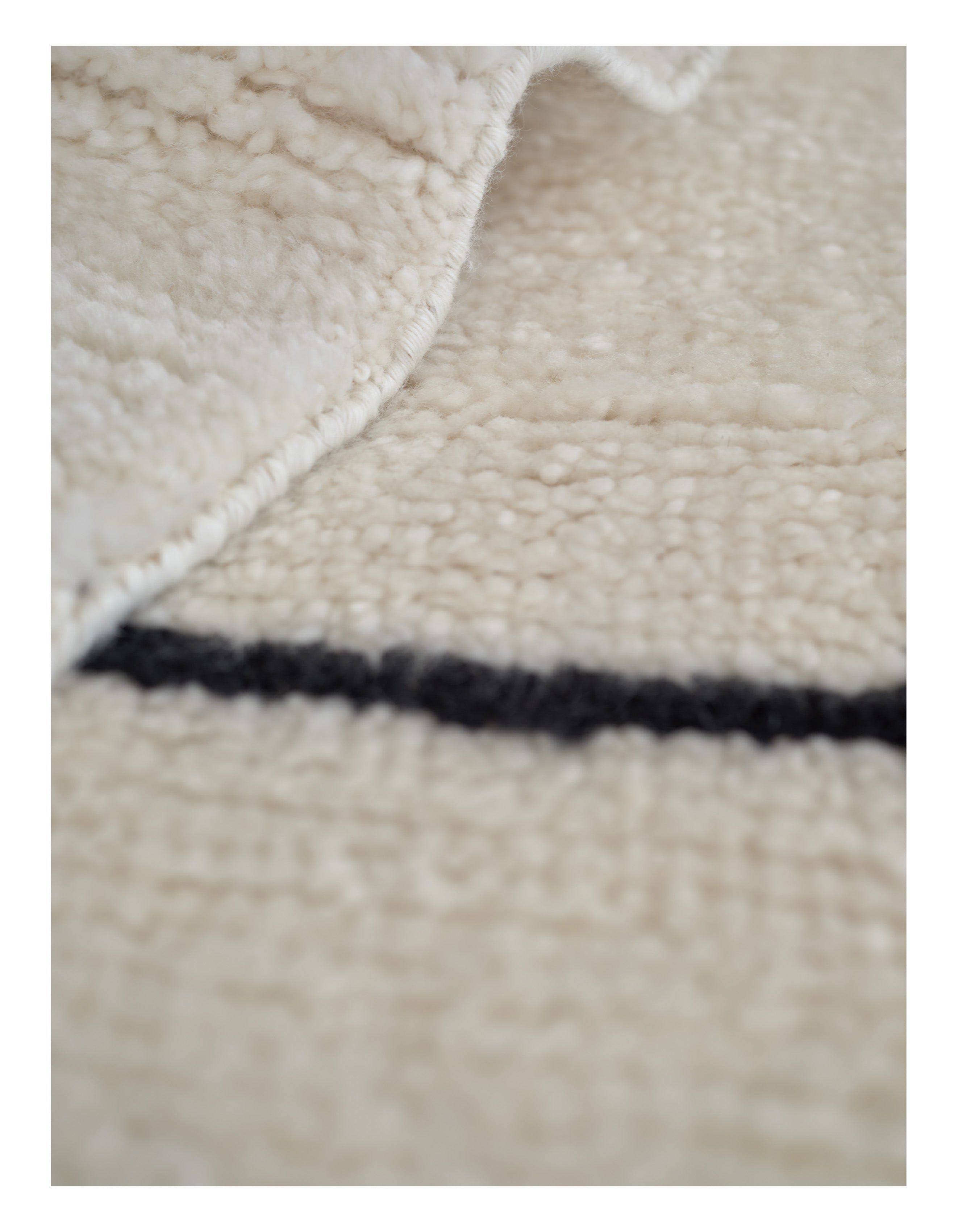 ASTRAL SPIRAL rug broken white with black pattern