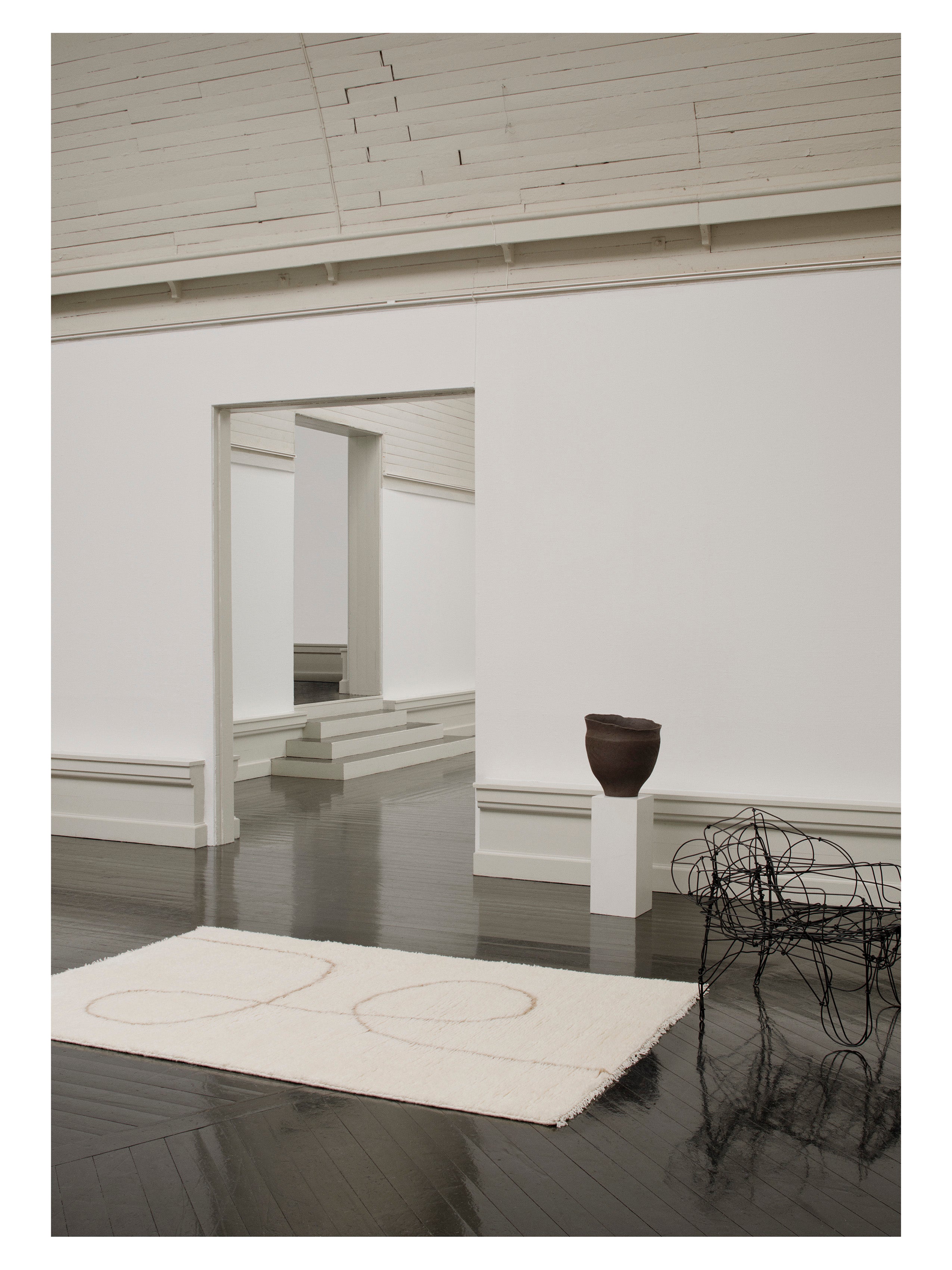 ASTRAL SPIRAL rug broken white with caramel pattern