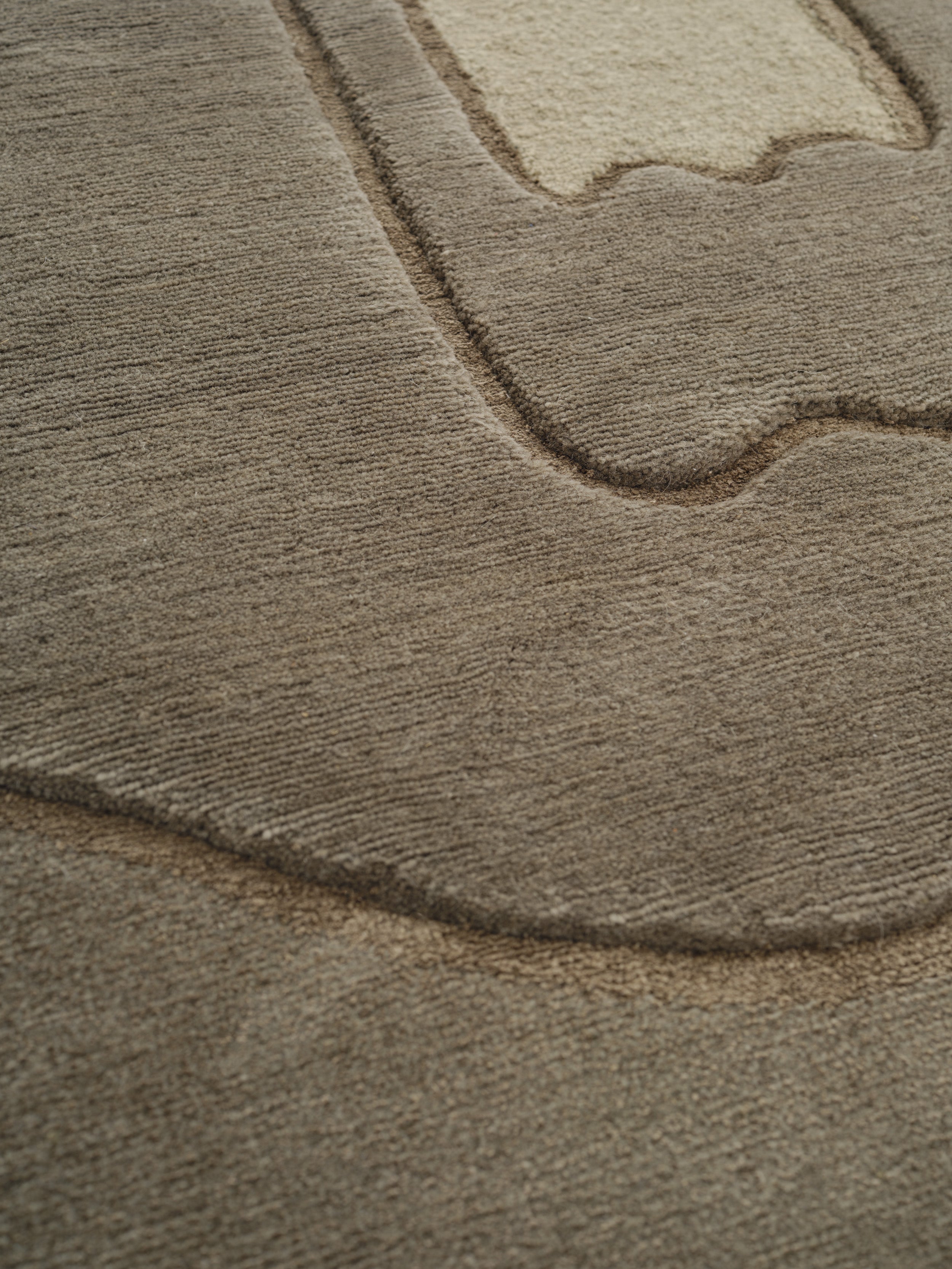 Decorative rug UNMASKED EYE dark green