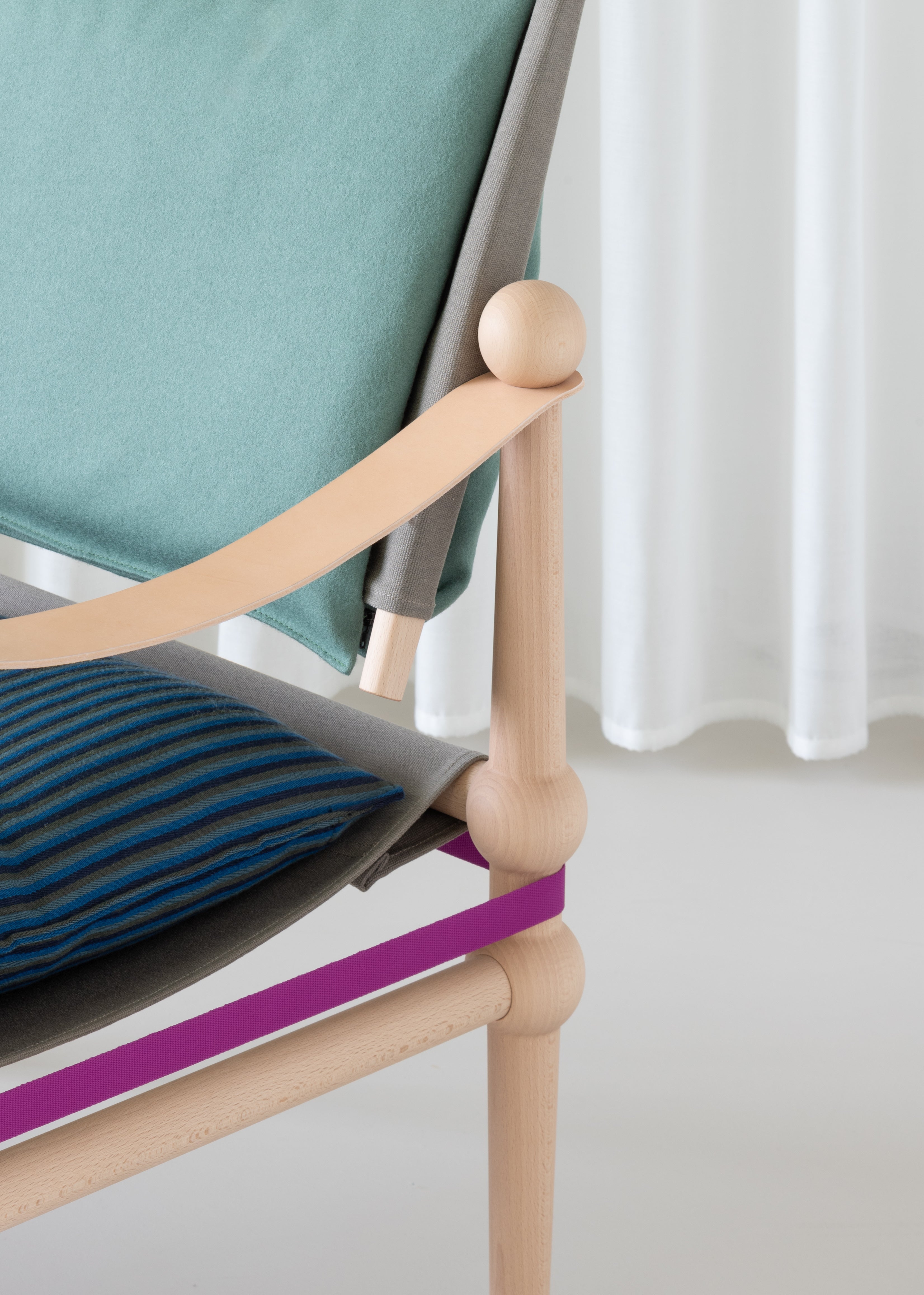 TWAIN armchair in burgundy with a black beech base