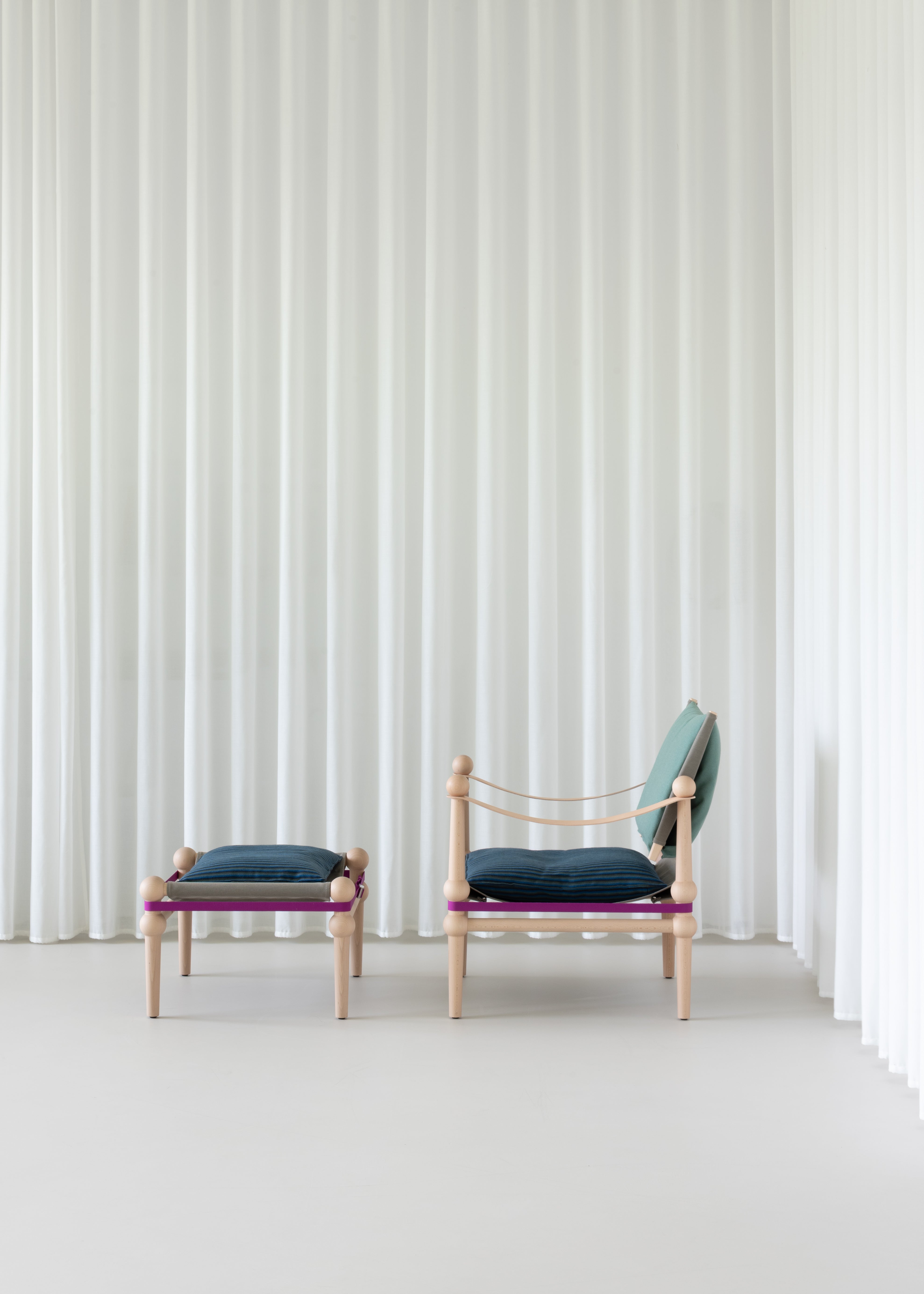 TWAIN ottoman customized with a black beech base