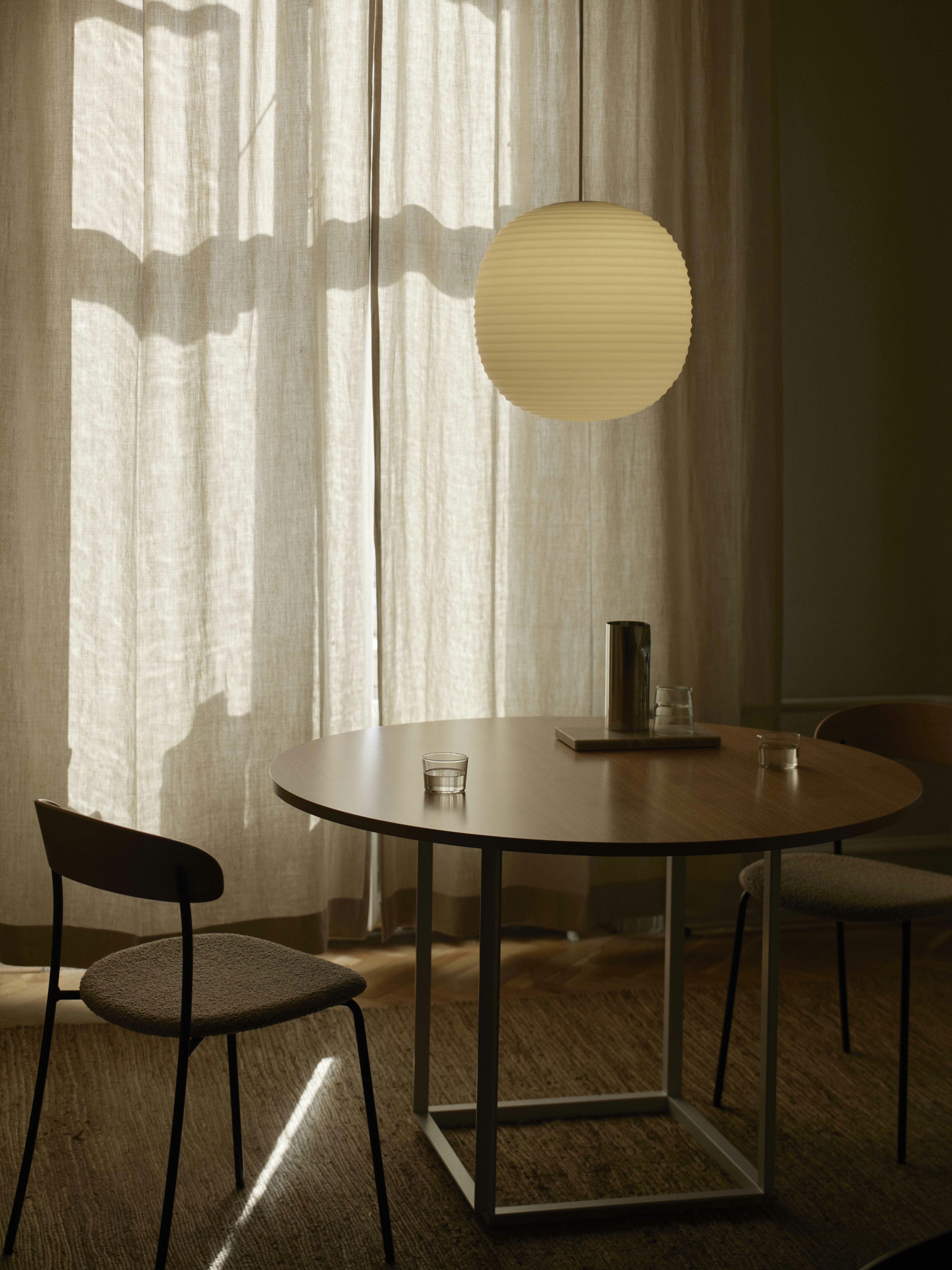 Missing chair upholstered with nut veneer