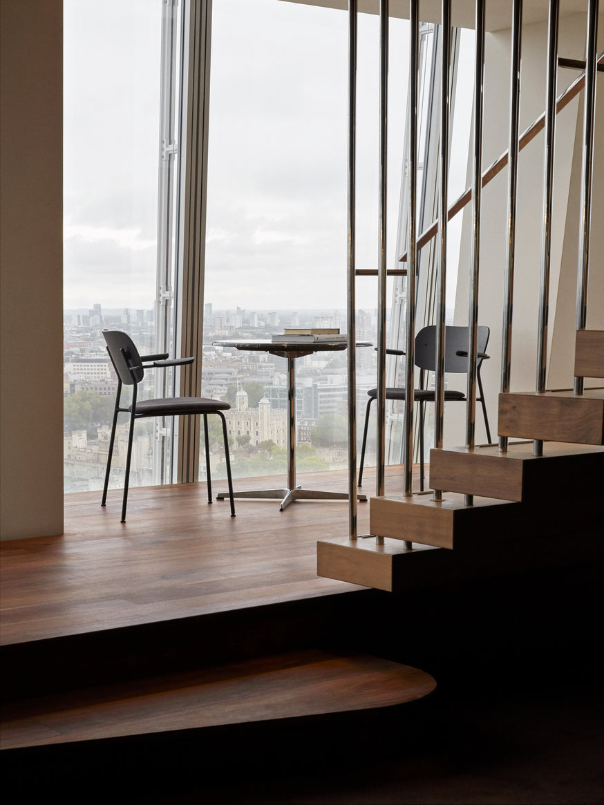 CO green armchair with chrome base