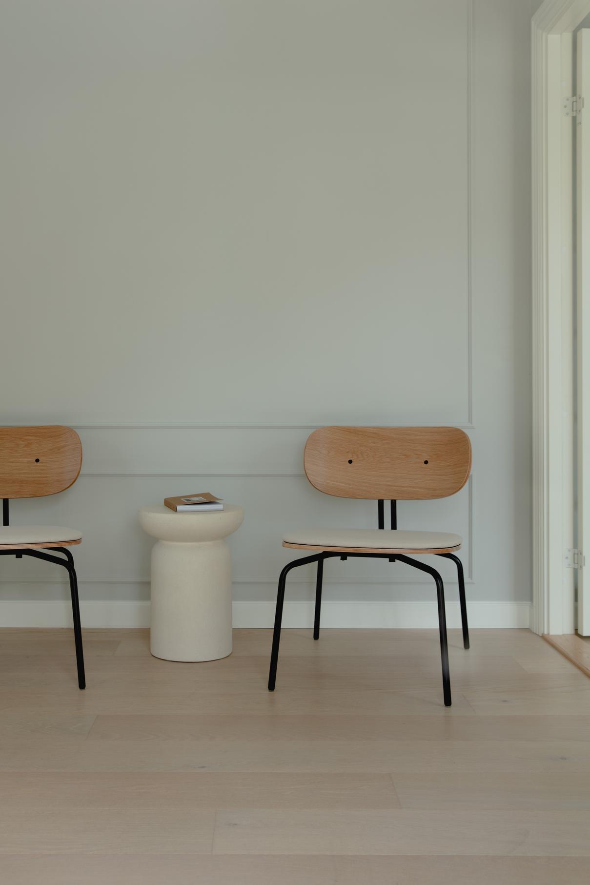 Curious chair cream plush with a black base