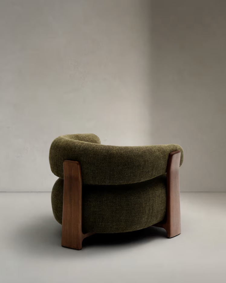 GRANITE green armchair with a dark ash base