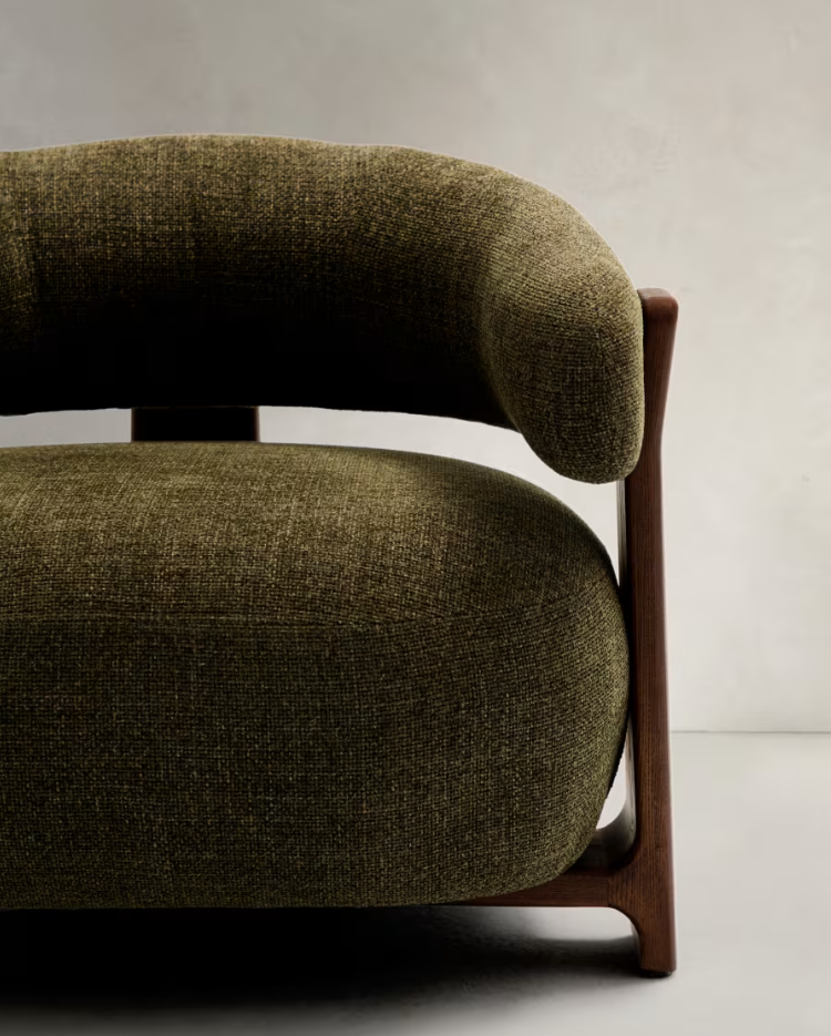 GRANITE green armchair with a dark ash base