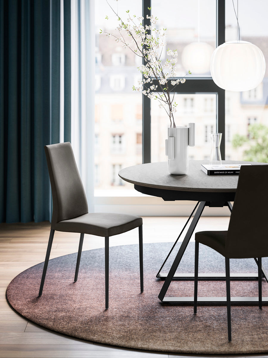 AIDA upholstered chair with a gray base