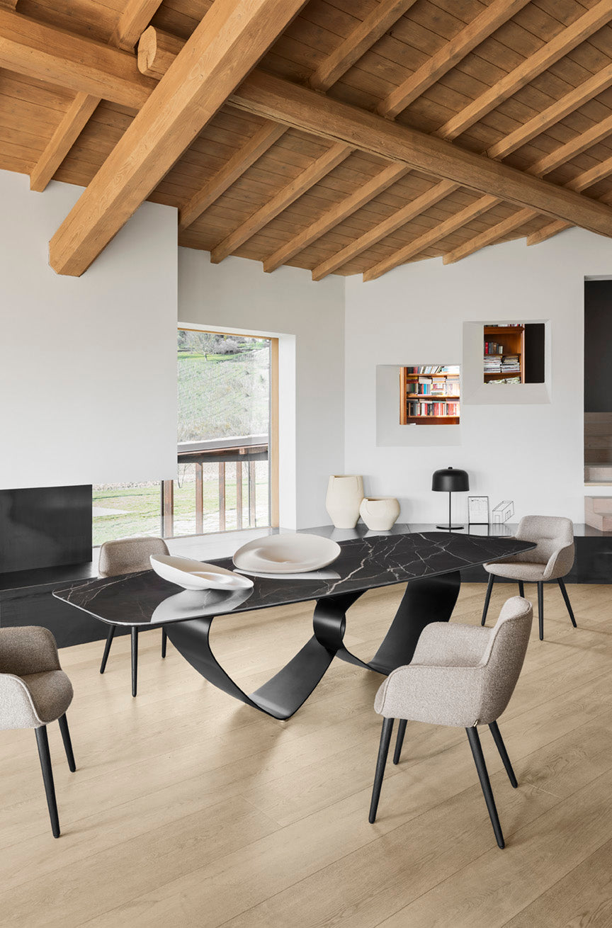 Cocoon upholstered chair with black metal base