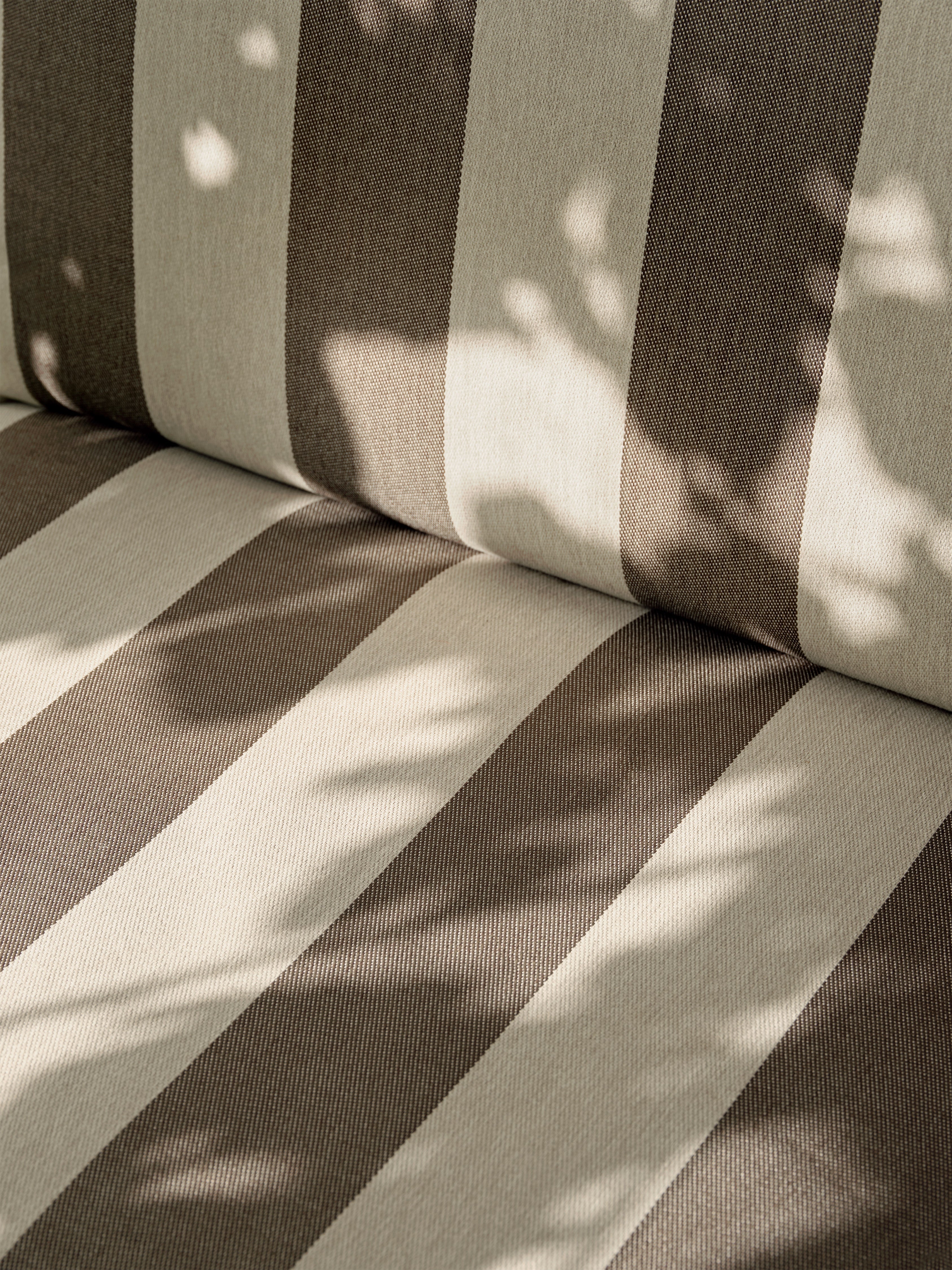 2-seater sofa desert cream-brown with a black base