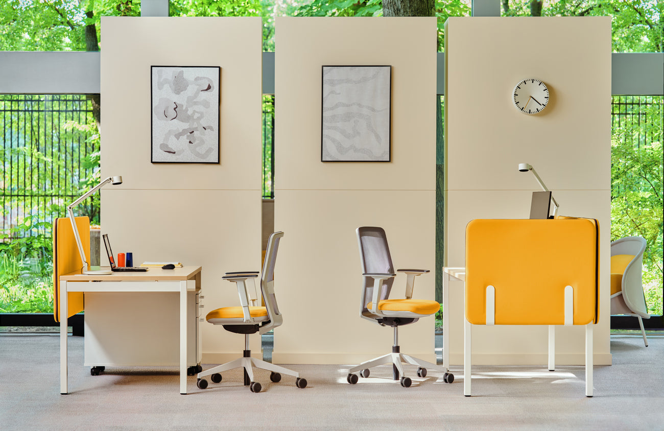 Armchair with an openwork EVO backrest adjustable base with wheels to the soft surface