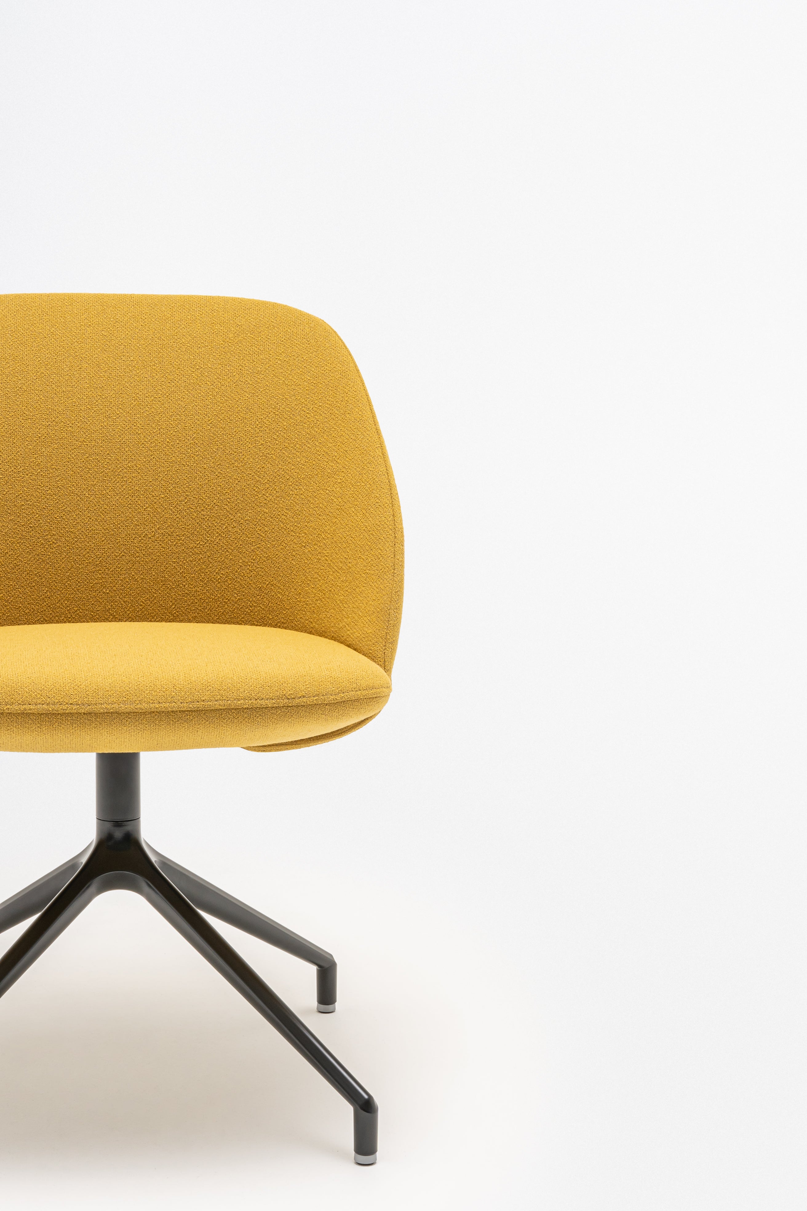 Rotable armchair with low backrest metal parallel base