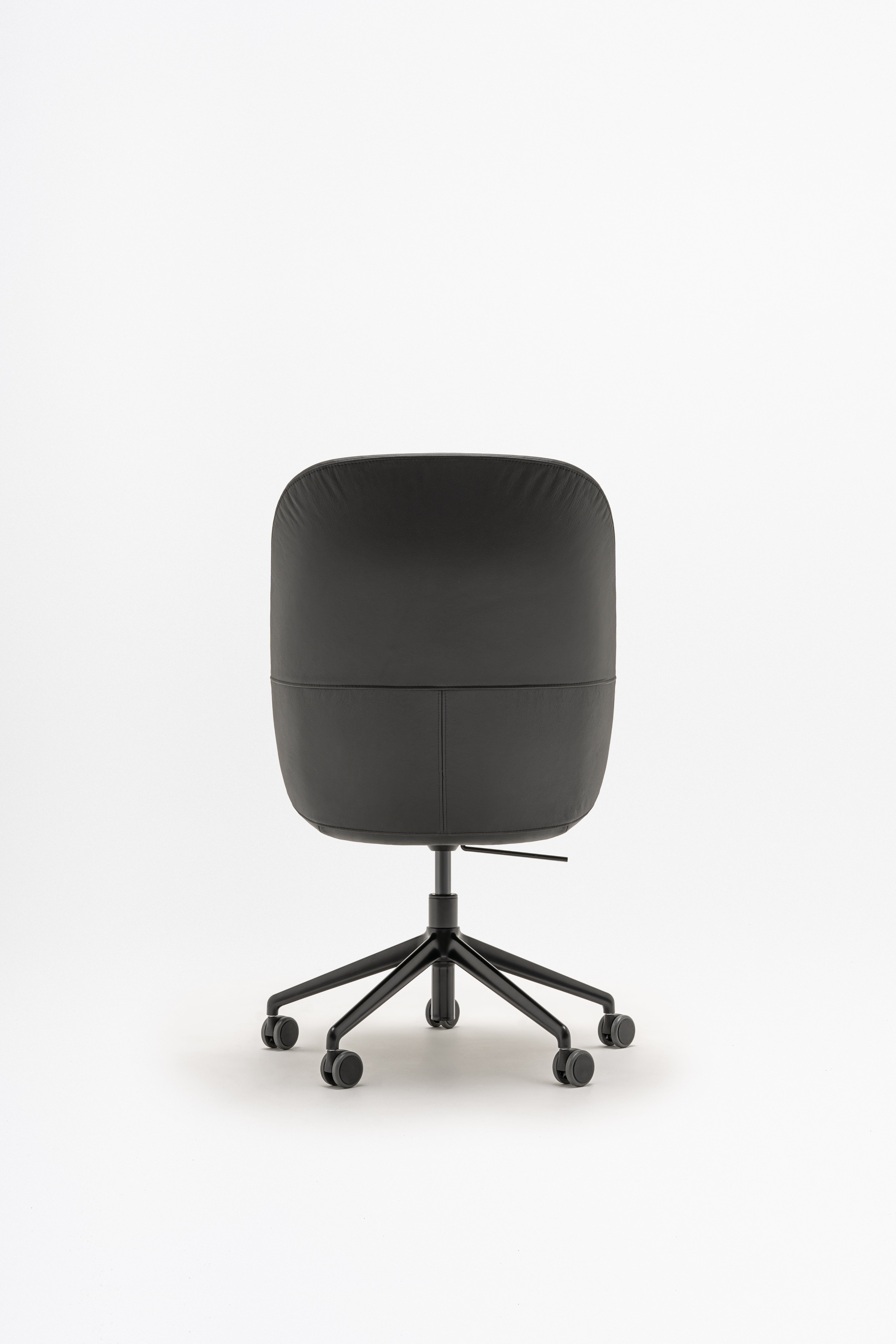 Conference armchair A regulated parallel base with wheels for a soft surface