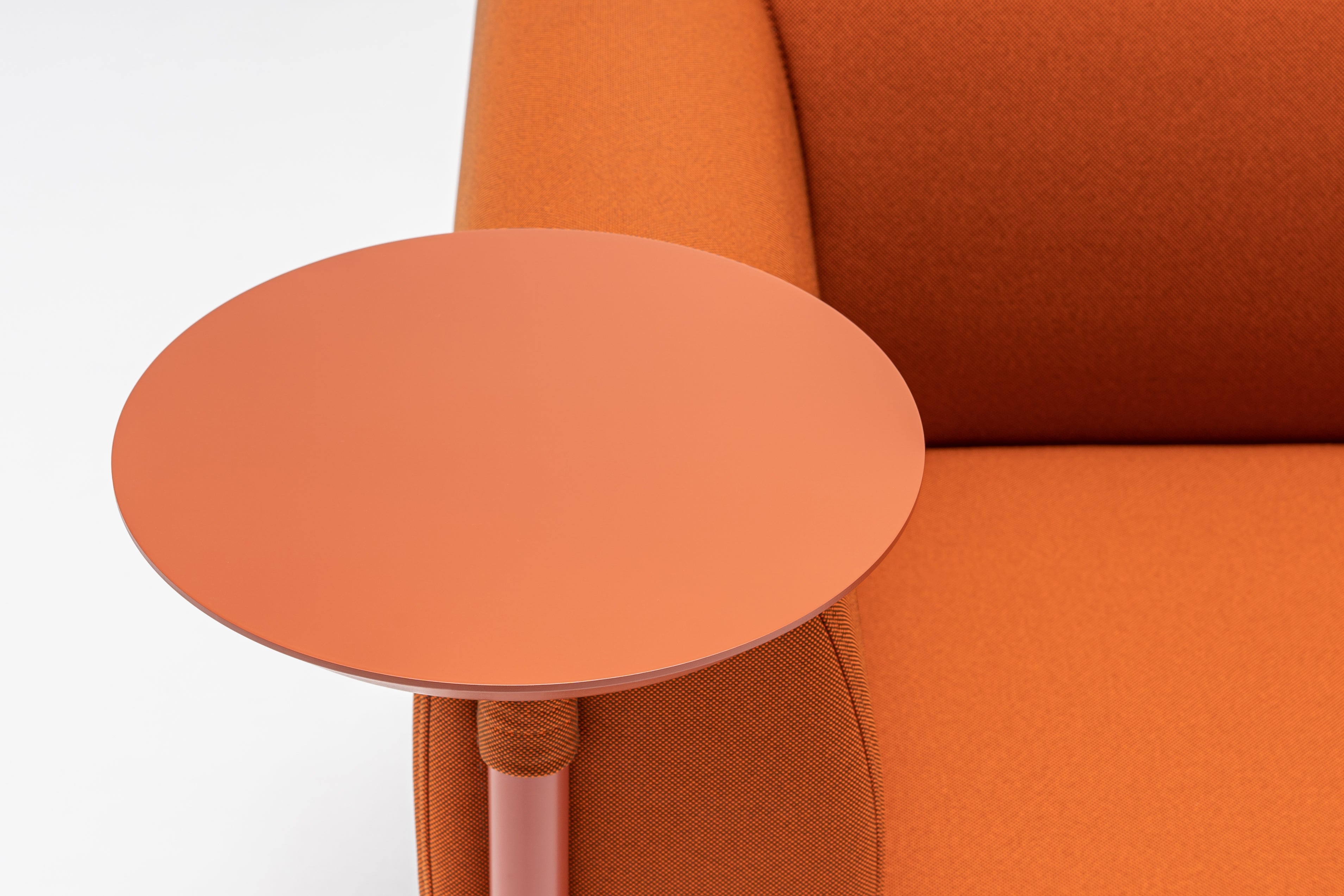 Low upholstered stilt armchair