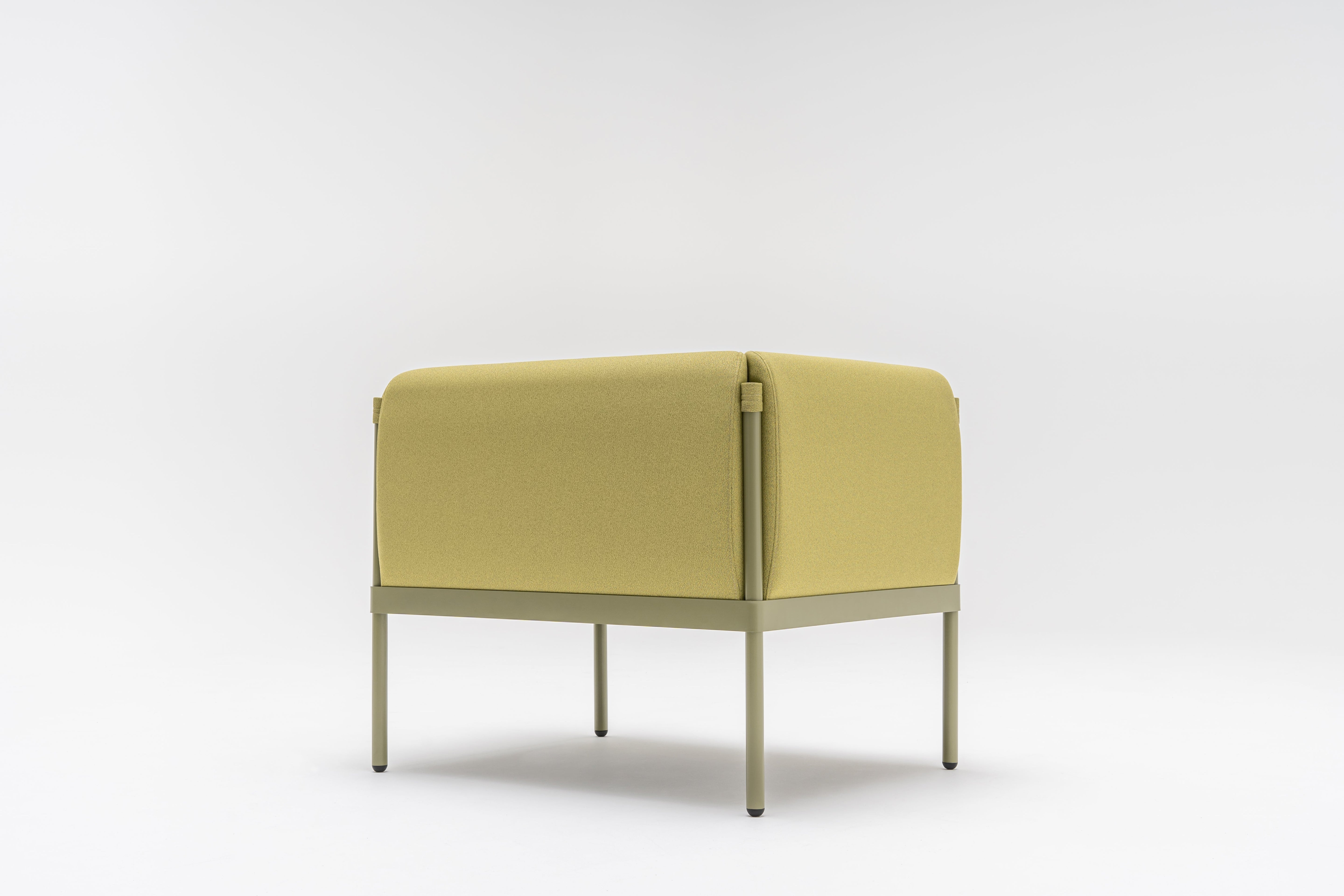 Low upholstered stilt armchair