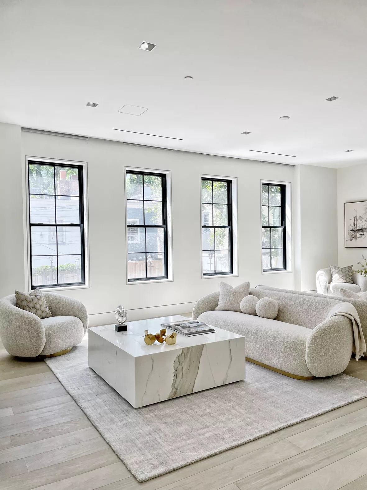 Sofa w tkaninie boucle BRICE kremowy Eichholtz Eye on Design