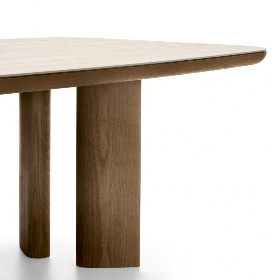 SANDY table with a ceramic top mimicking travertine and a walnut base