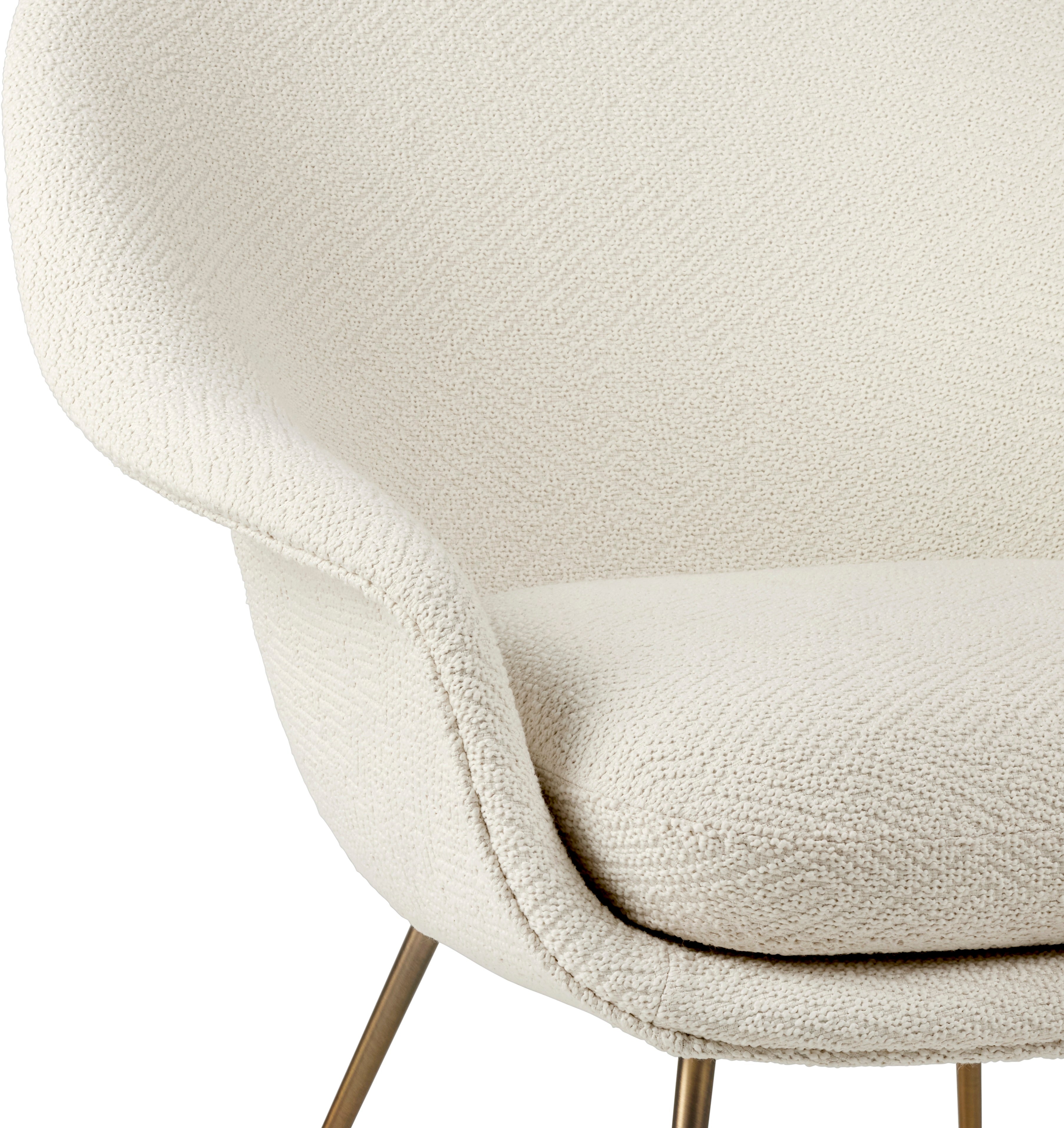 Upholstered BAT armchair with brass base