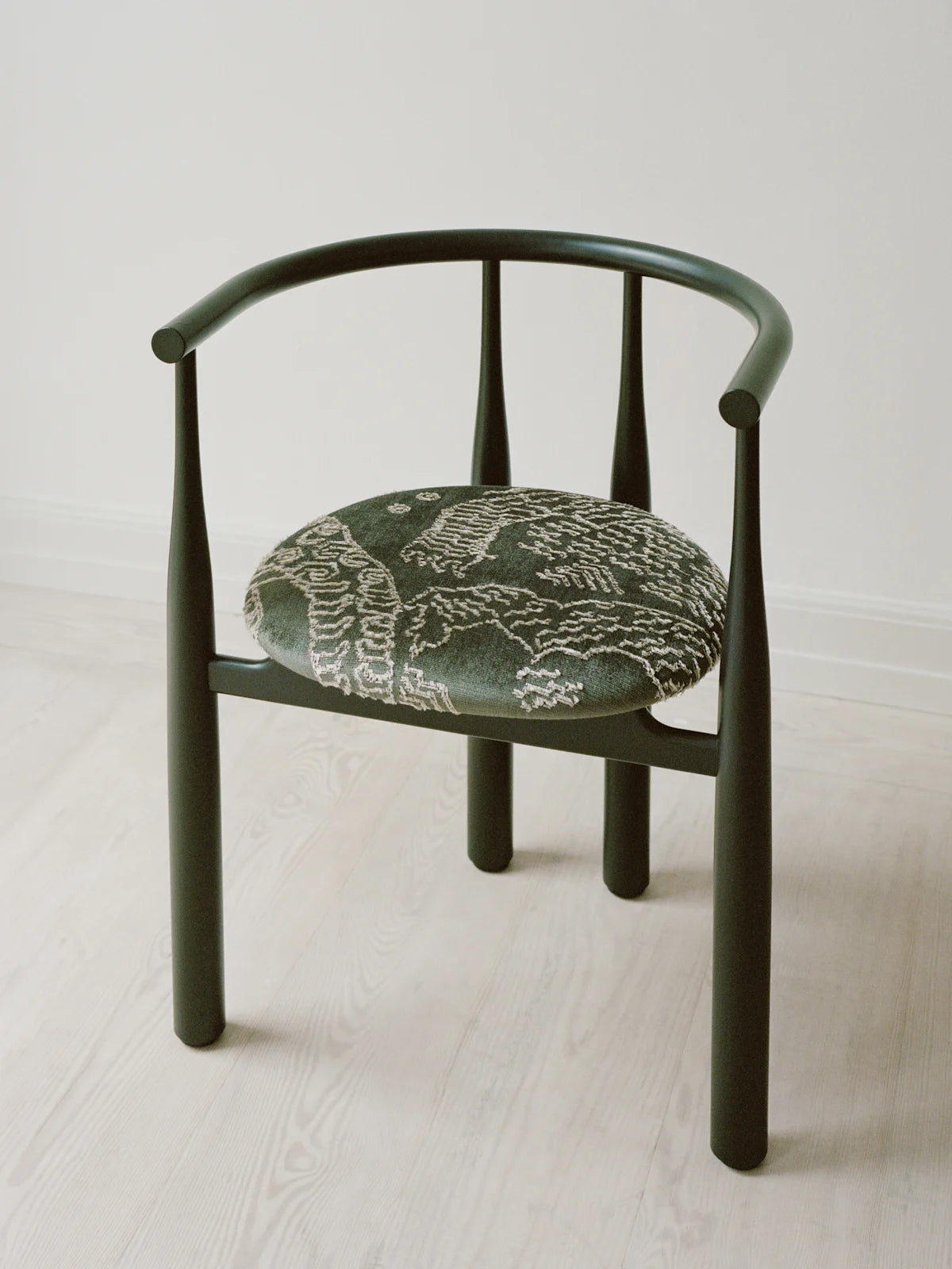 Bukowski chair animal print with a black beech base