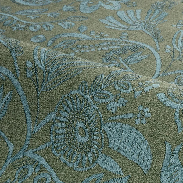 Structural wallpaper imitating embroidery with a floral and leaf pattern in pastel green with blue