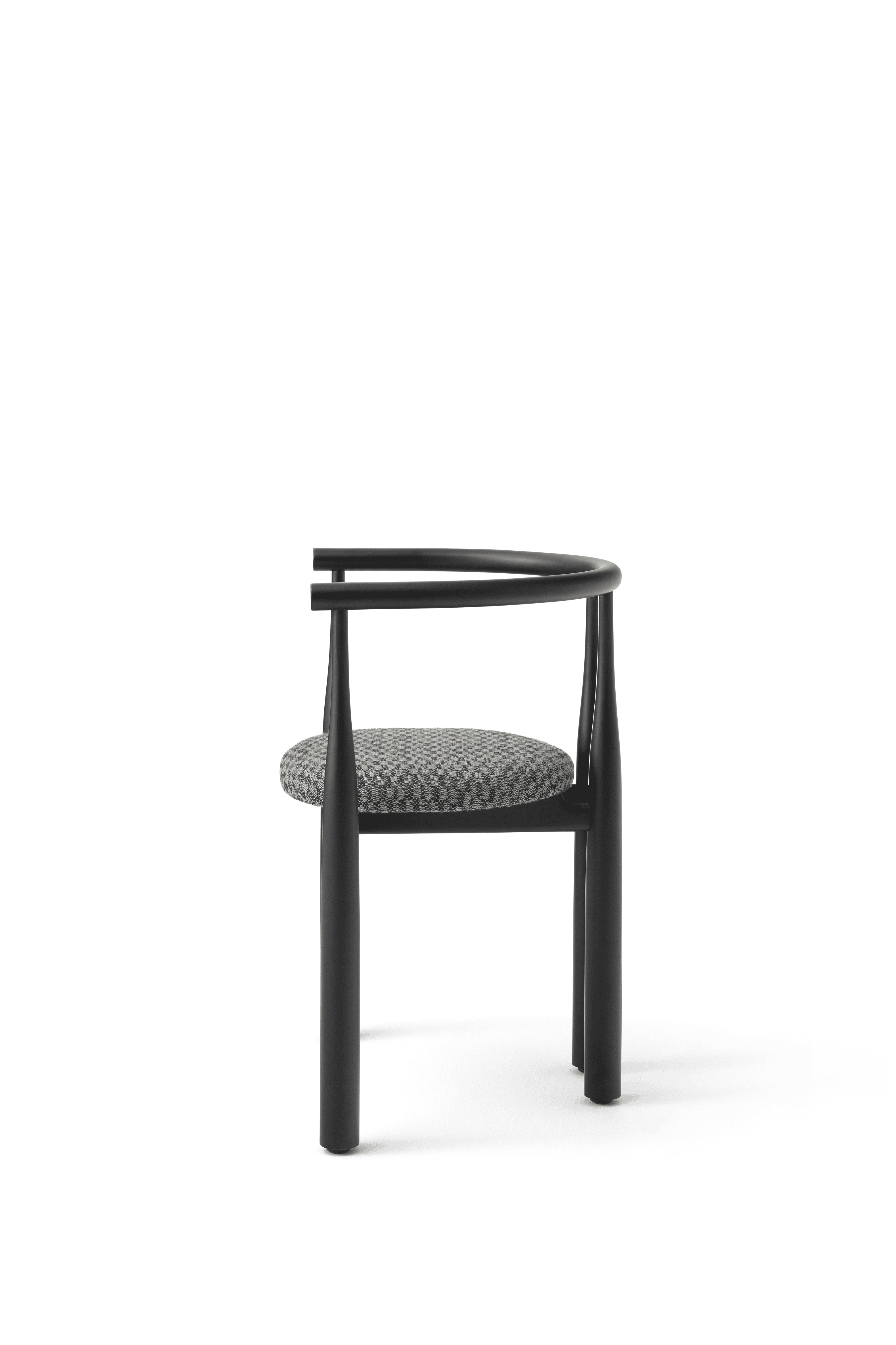 Bukowski chair upholstered with a black beech base