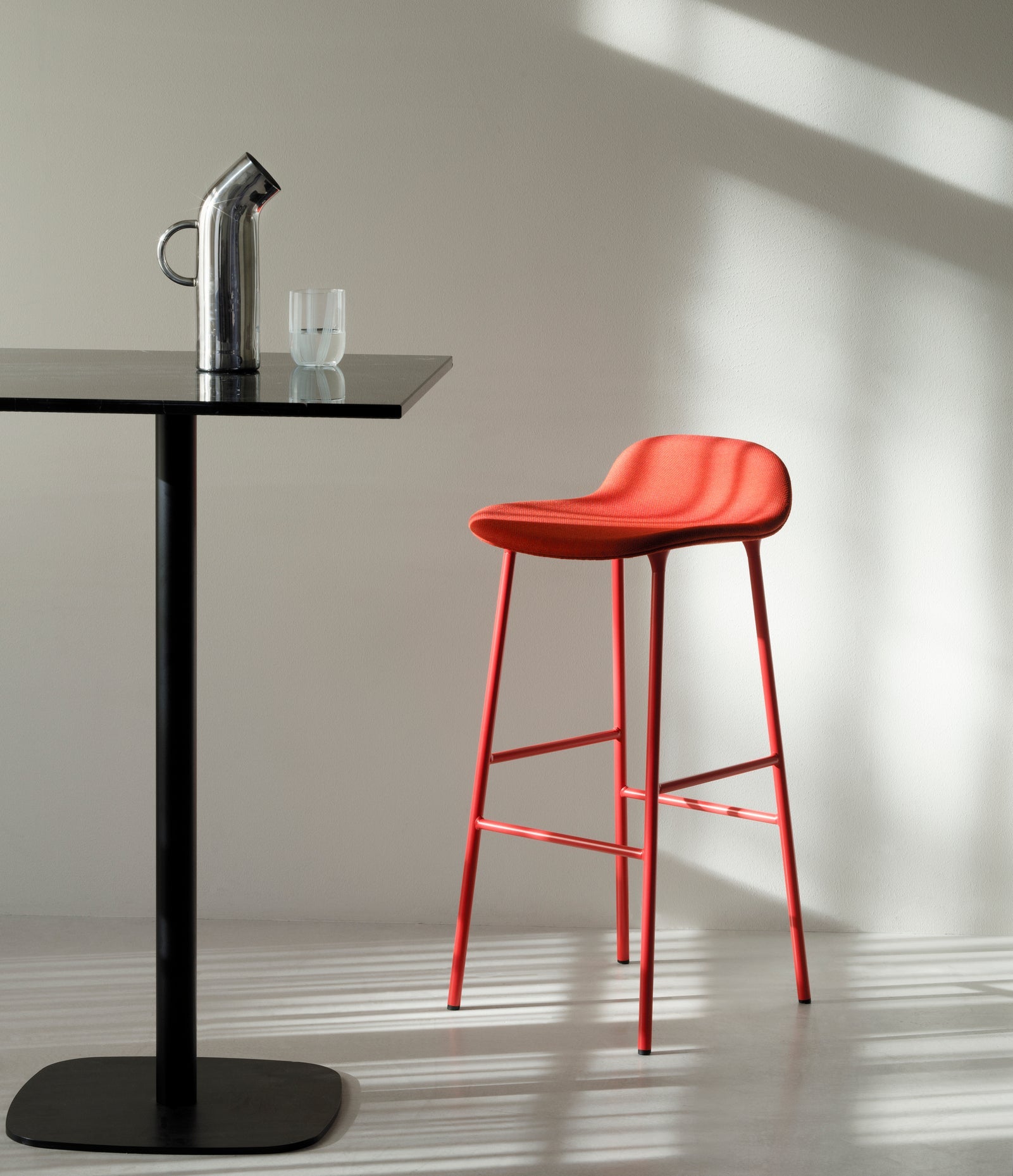 Upholstered HAKER forms with a black base