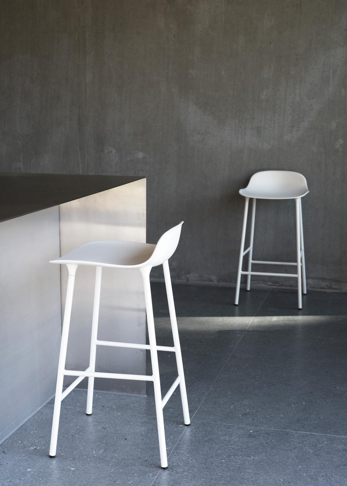 Hocker forms warm gray with a chrome base