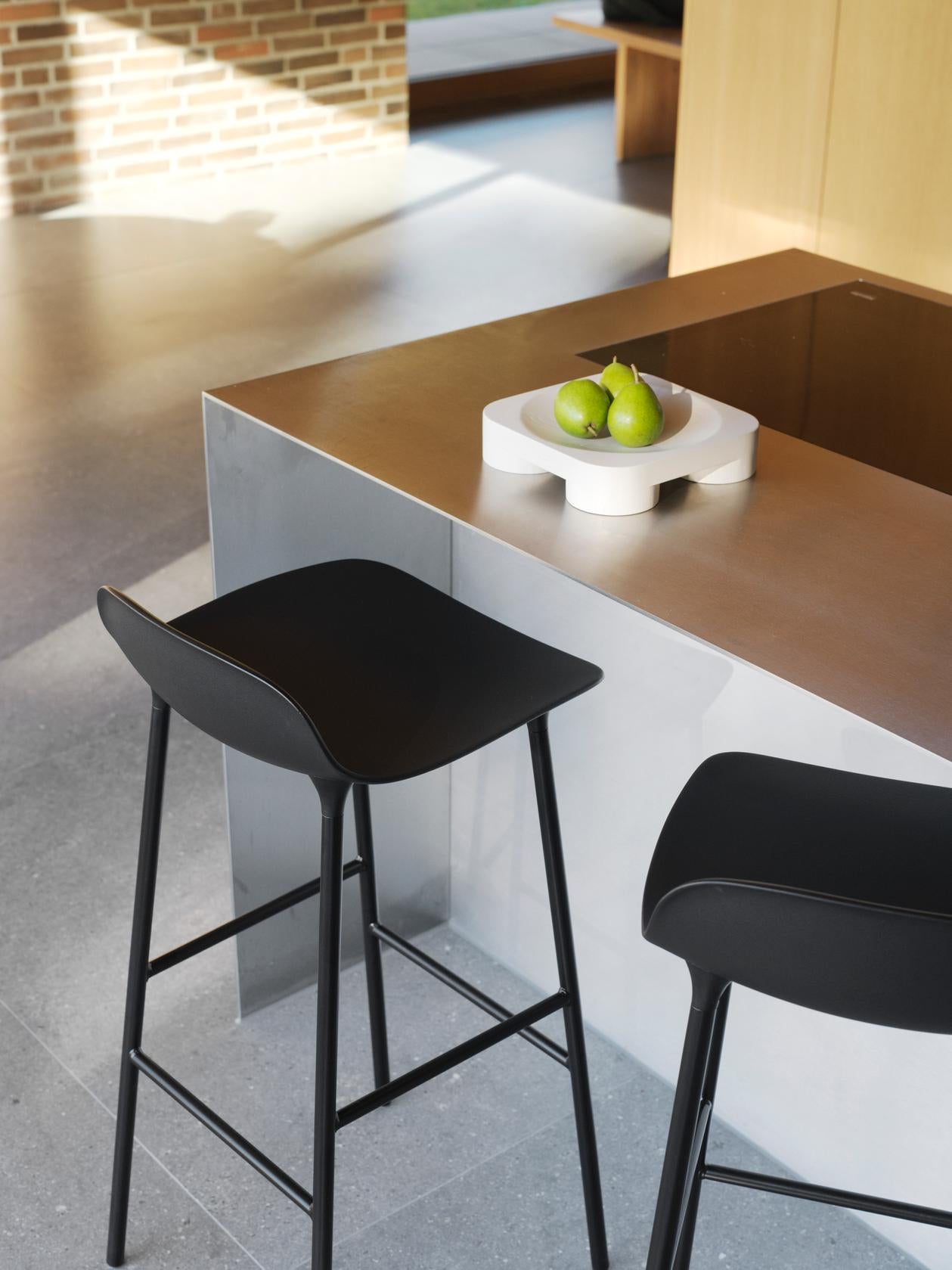 Hocker forms warm gray with a golden base