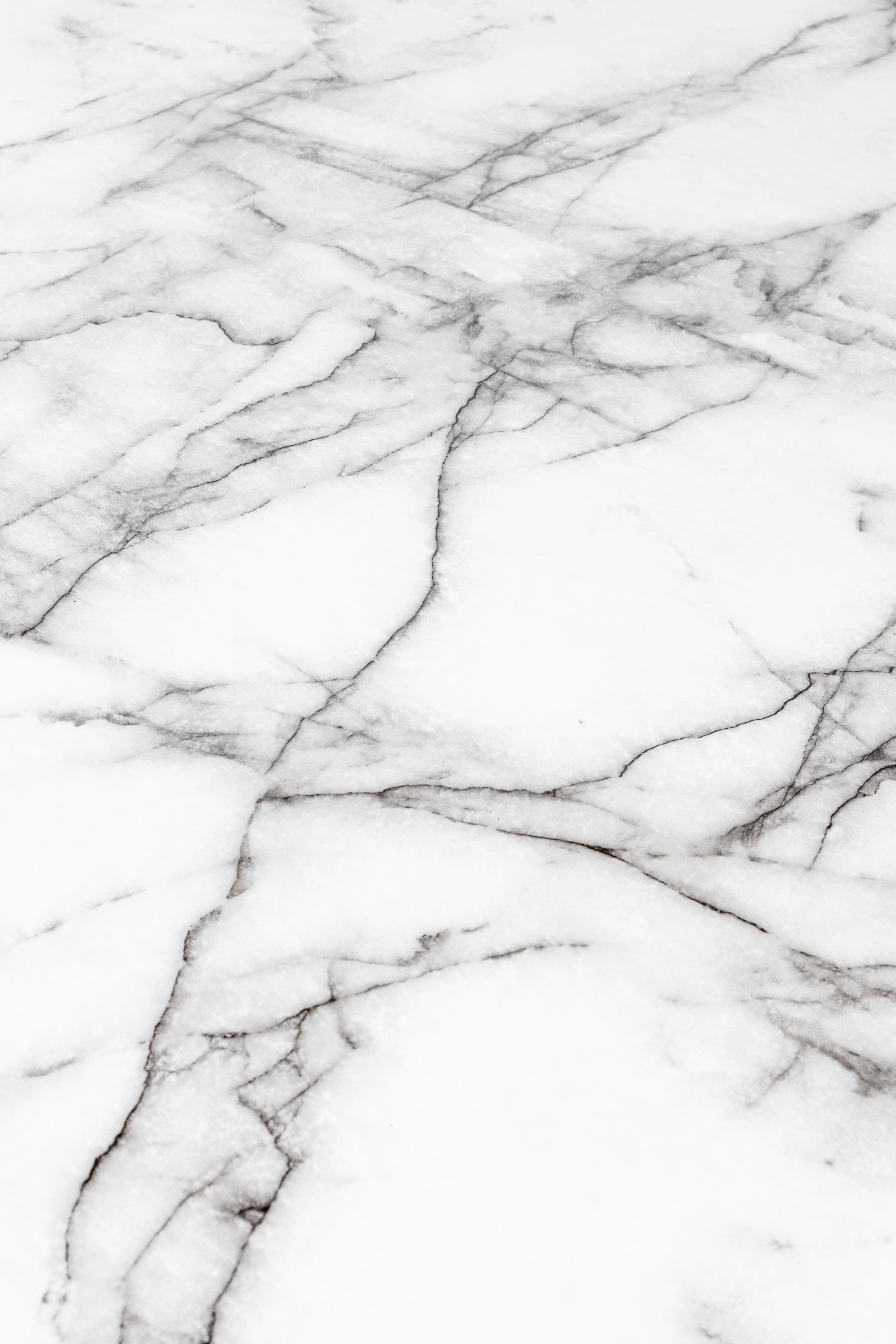 Okrúhly stôl FLORIS biely mramor s čiernym podstavcom