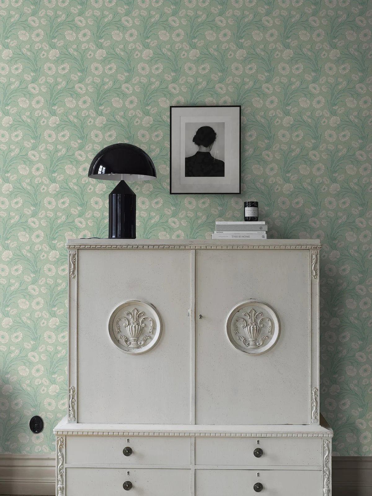 Green floral pattern wallpaper with beige poppy flowers