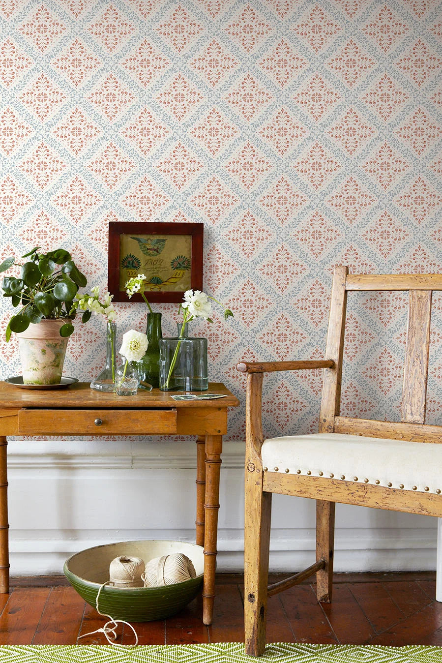 Non-woven paper wallpaper with abstract pattern NYBORG terracotta with blue